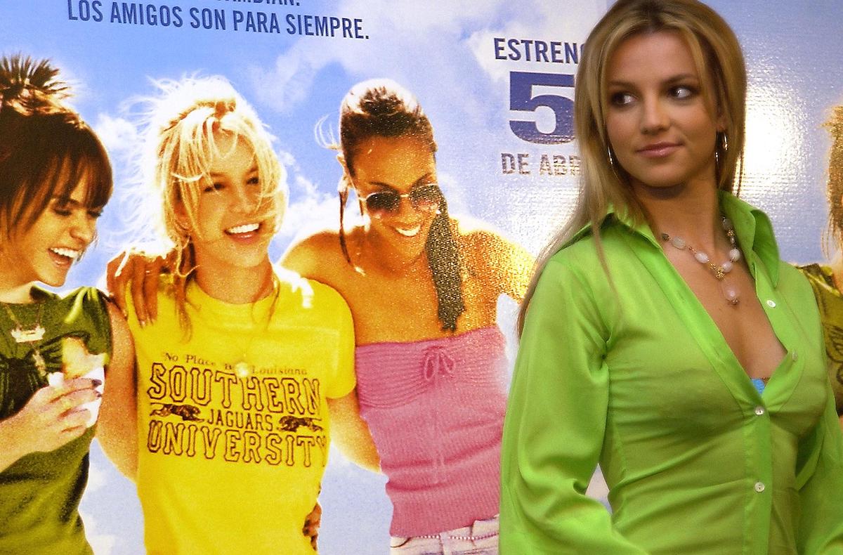 Britney Spears at a movie event for 'Crossroads' wearing a green shirt