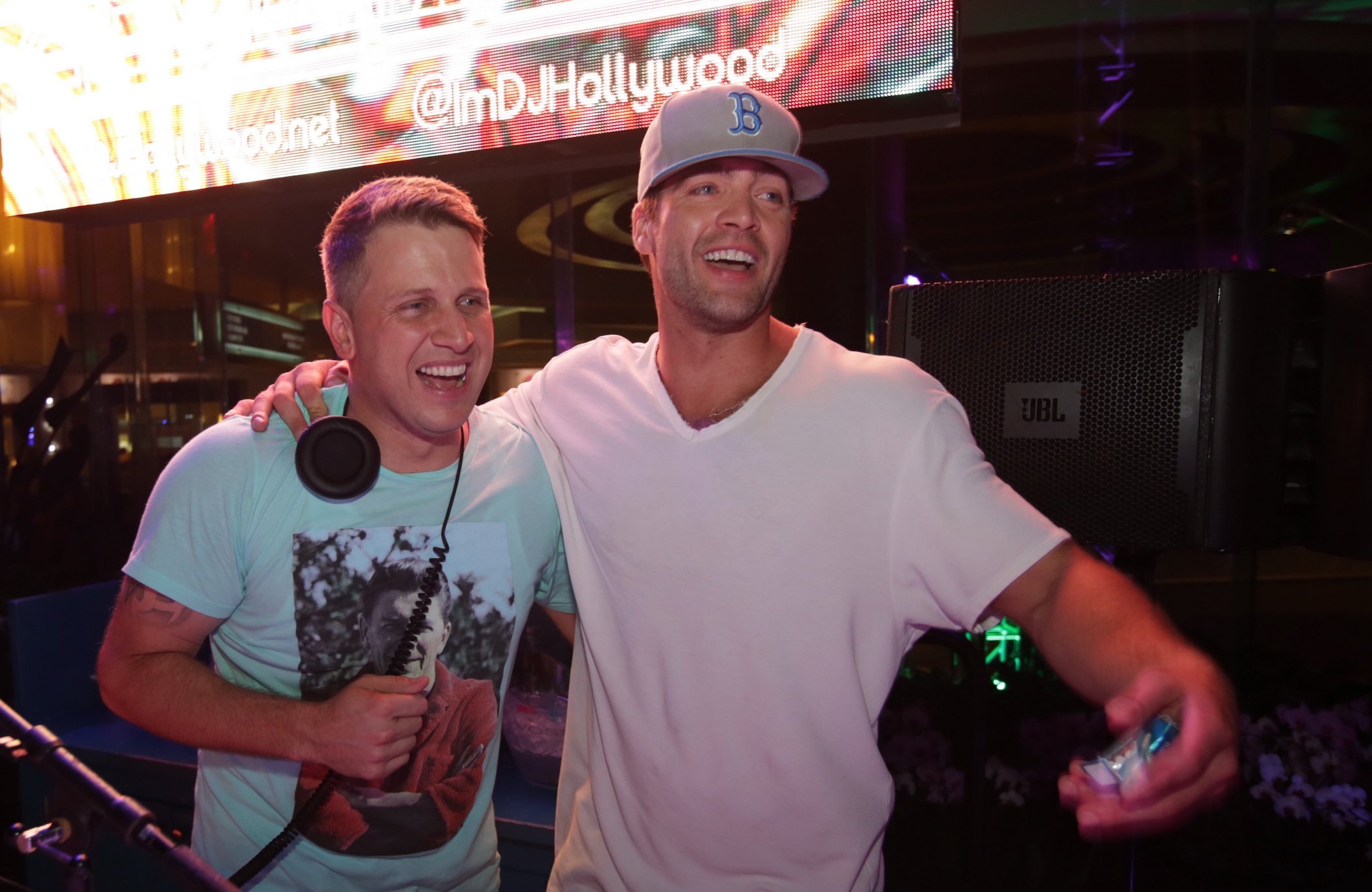 CT Tamburello from MTV's 'The Challenge' Season 37 cast laughing and hanging out with a friend at a birthday party in 2014