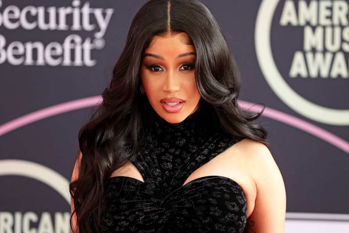Cardi B poses at an event.