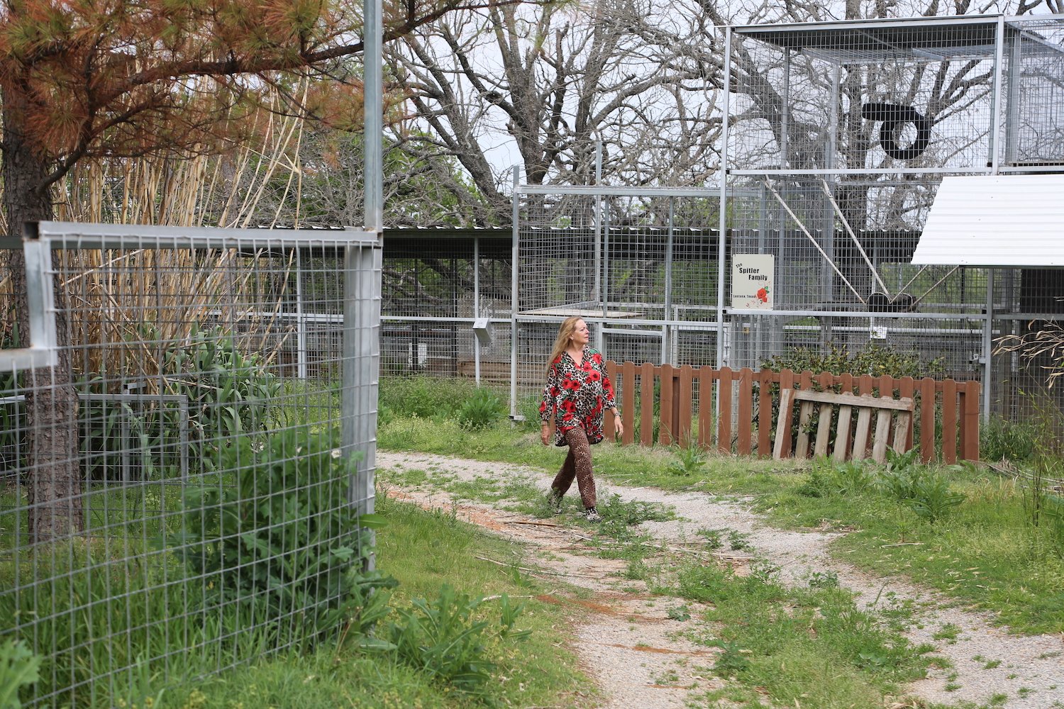 Carole Baskin walks through Tiger King Joe Exotic's former G.W. Zoo