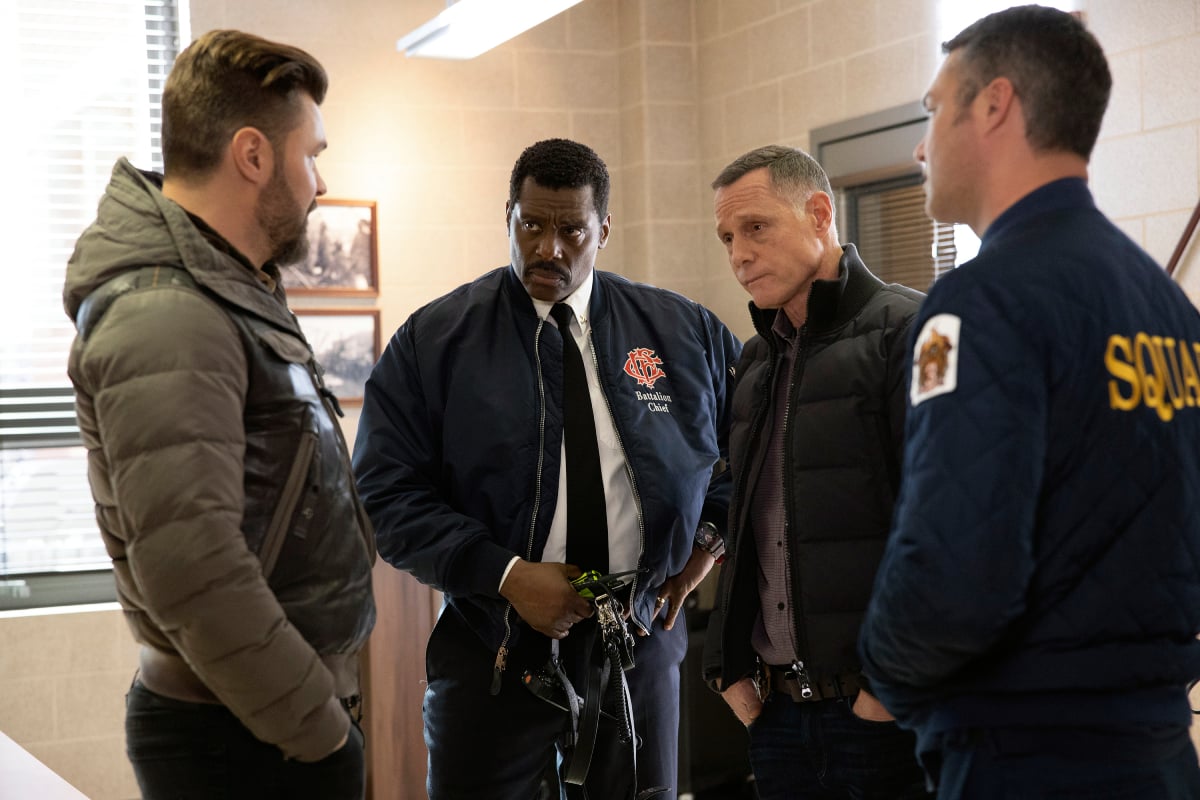 Patrick John Flueger as Adam Ruzek, Eamonn Walker as Wallace Boden, Jason Beghe as Hank Voight, and Taylor Kinney as Kelly Severide in the One Chicago crossover episode.