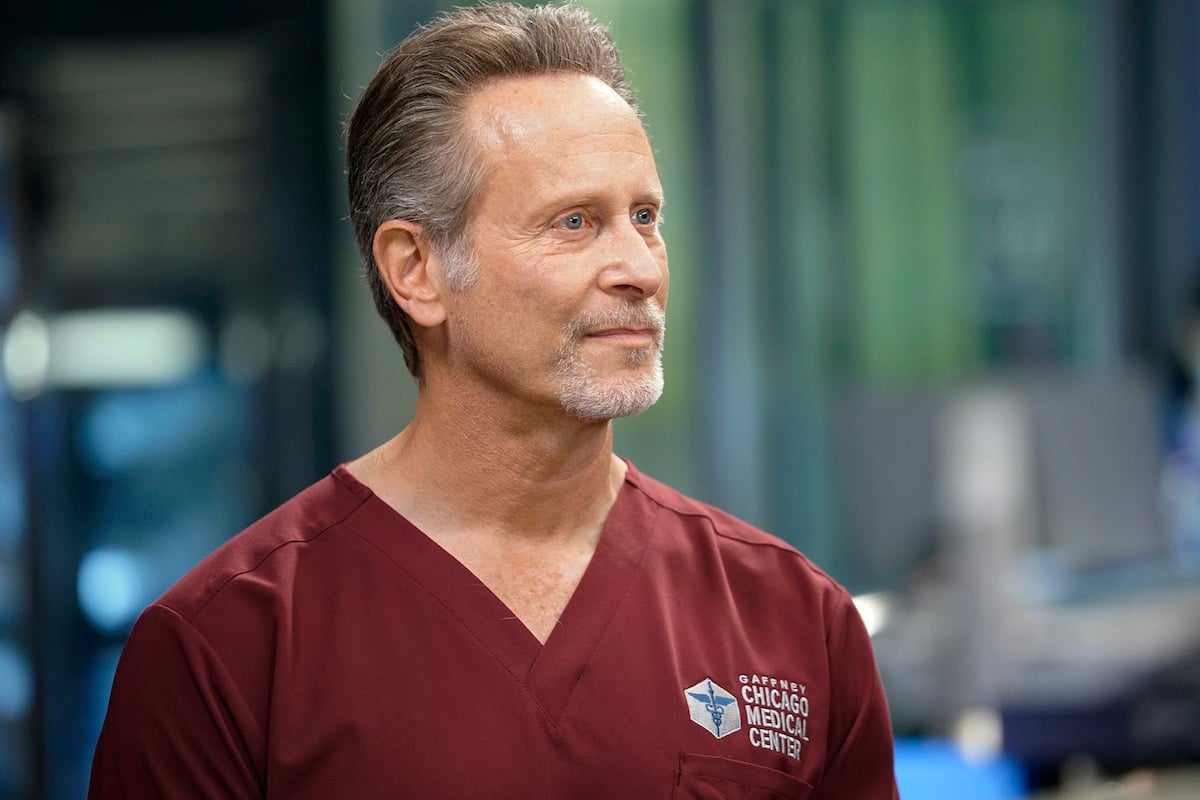 Steven Weber as Dr. Dean Archer smiling, looking to the right