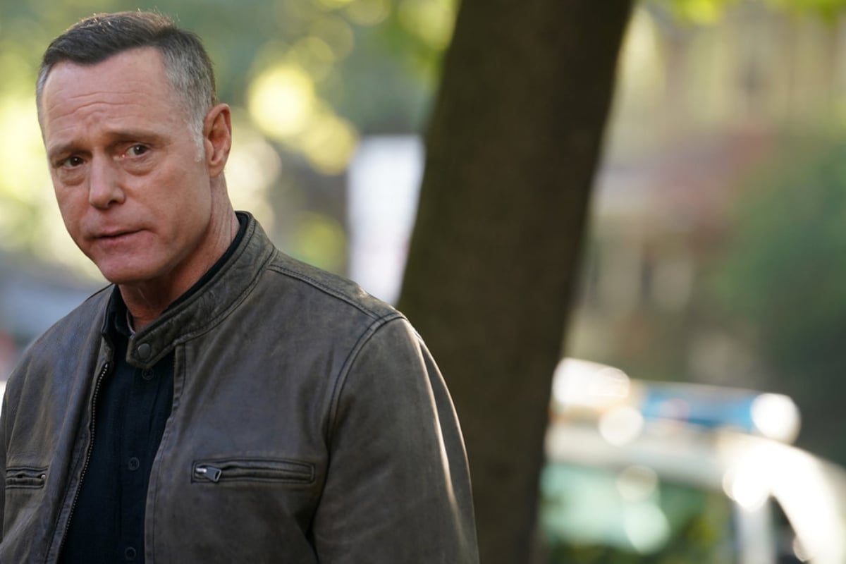 Jason Beghe as Hank Voight in 'Chicago P.D.' Season 9. Voight is wearing a leather jacket and looks worried.