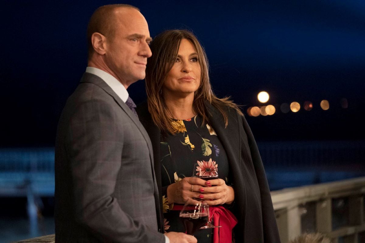 Christopher Meloni and Mariska Hargitay standing outside as Elliot Stabler and Olivia Benson in 'Law & Order: SVU'