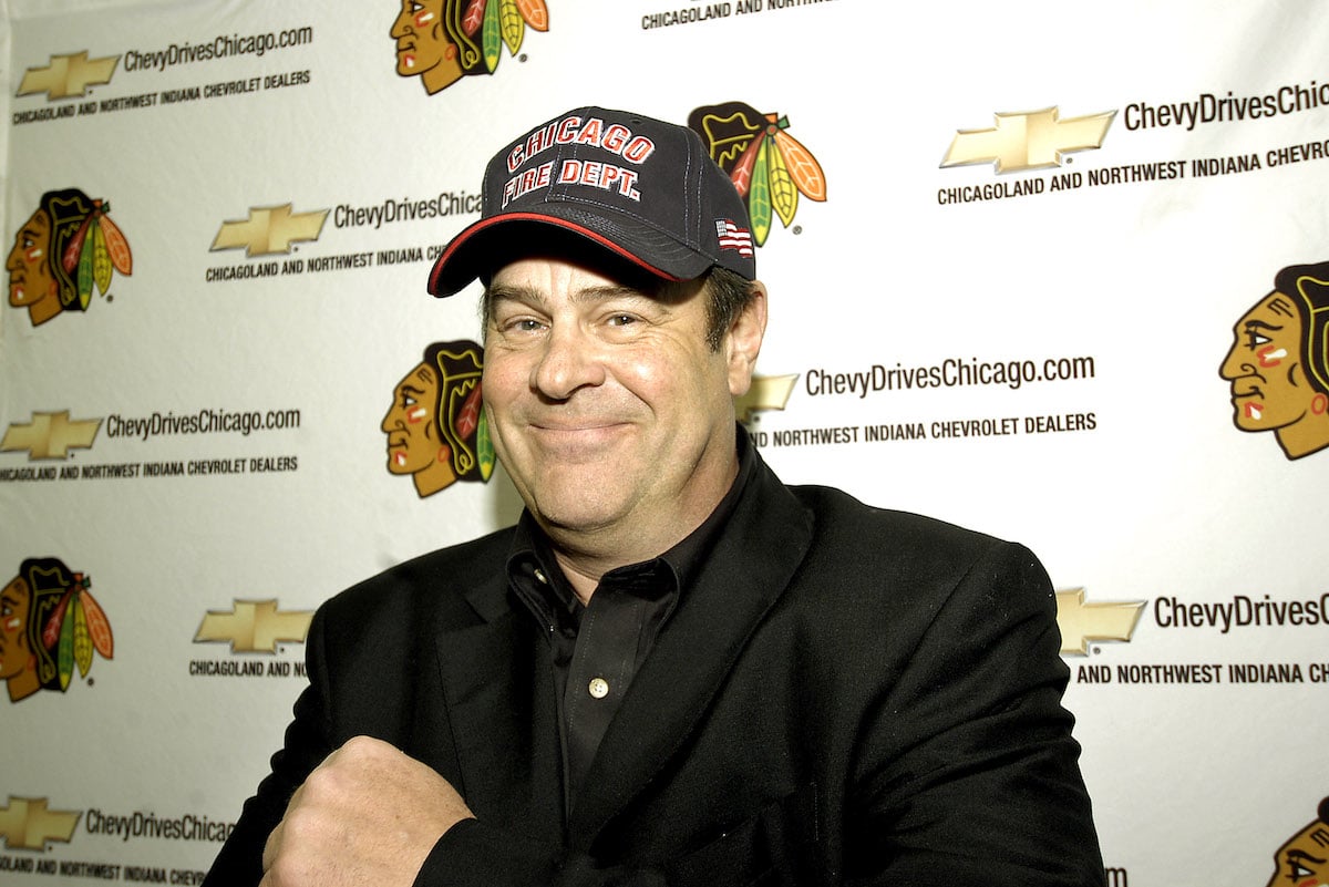 Dan Aykroyd, who plays Britney Spears' Dad in 'Crossroads,' wearing a ball cap