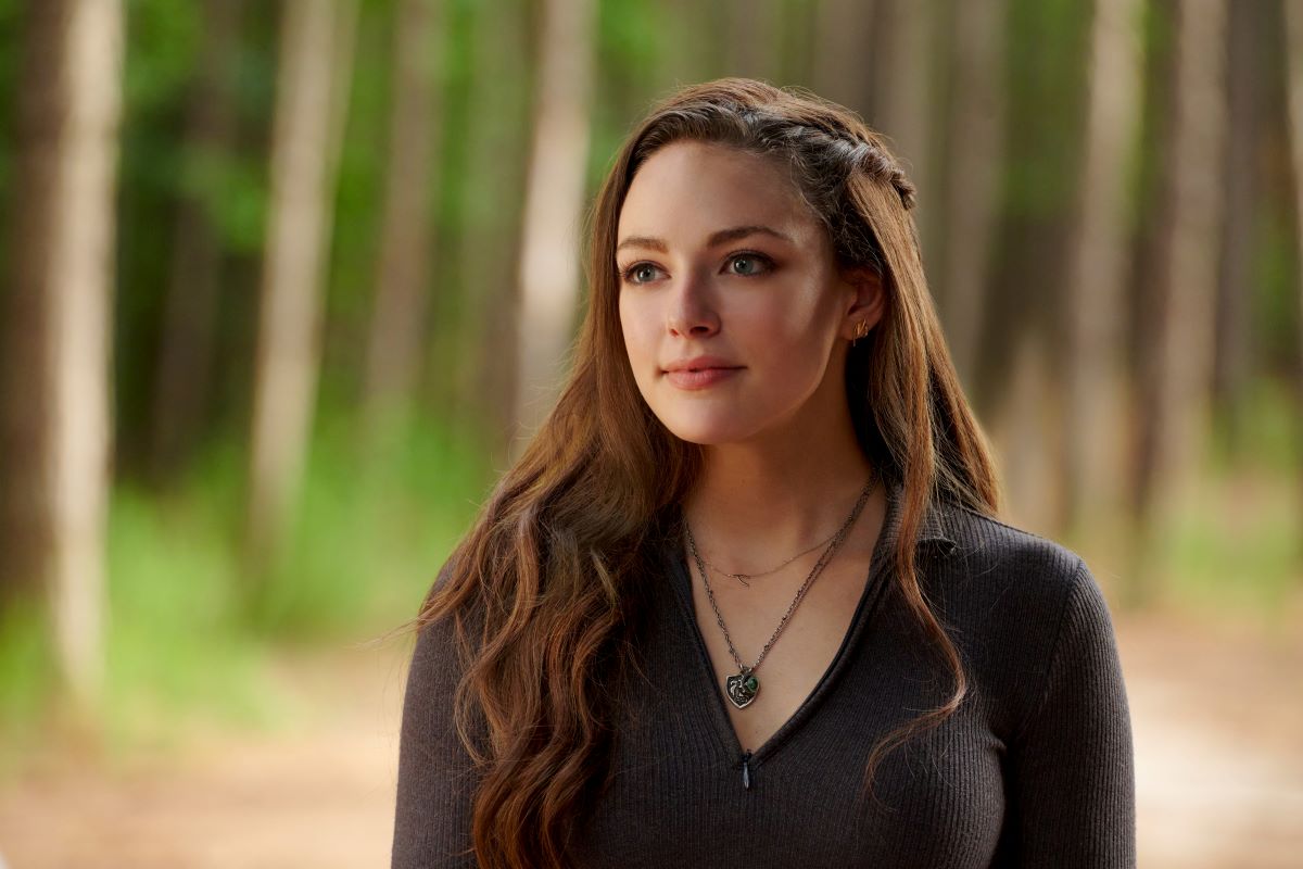 Danielle Rose Russell smiling in a black top and necklace as Hope Mikaelson in 'Legacies'