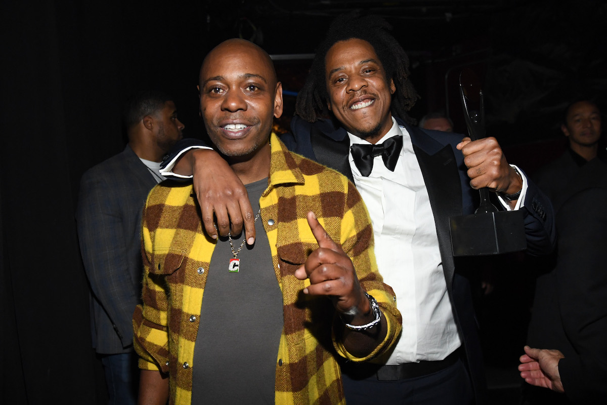 Dave Chappelle and Jay-Z backstage during the 36th-annual Rock & Roll Hall of Fame Induction Ceremony at Rocket Mortgage Fieldhouse on October 30, 2021, in Cleveland, Ohio