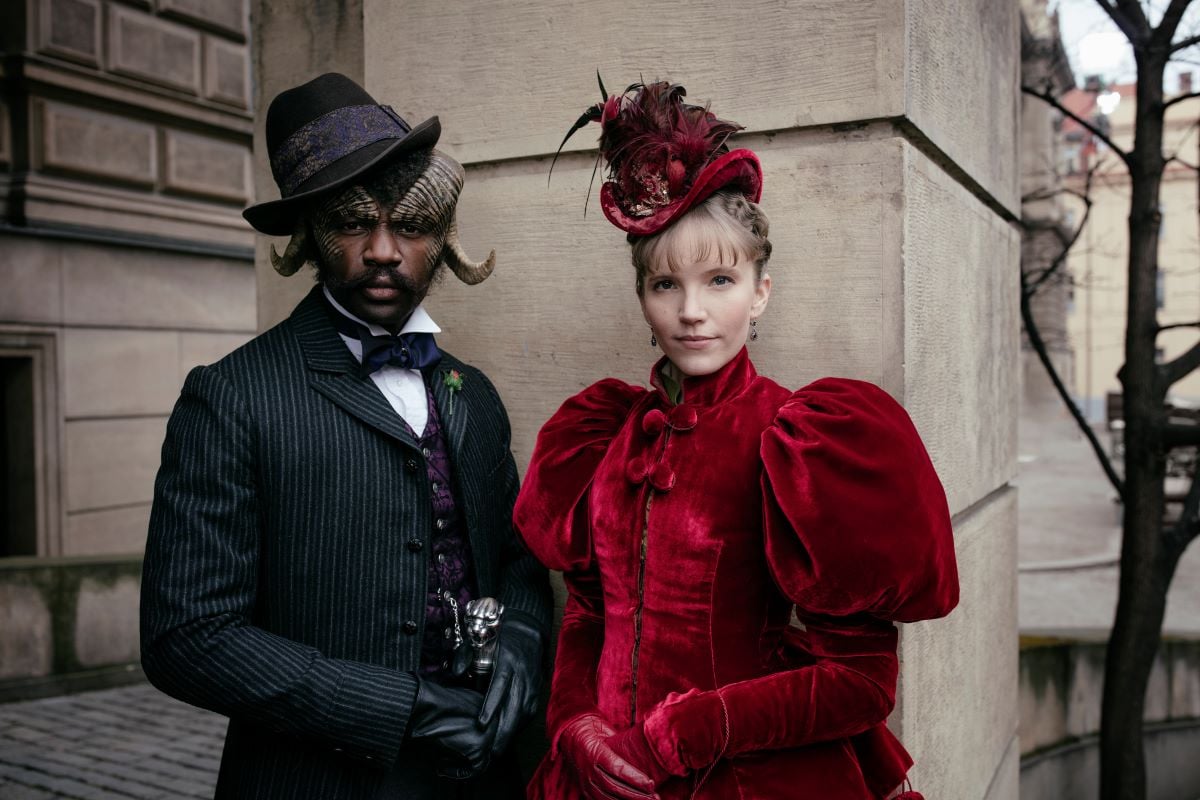David Gyasi as a the horned faun Agreus and Tamzin Merchant as the socialite Imogen Spurnrose in 'Carnival Row'
