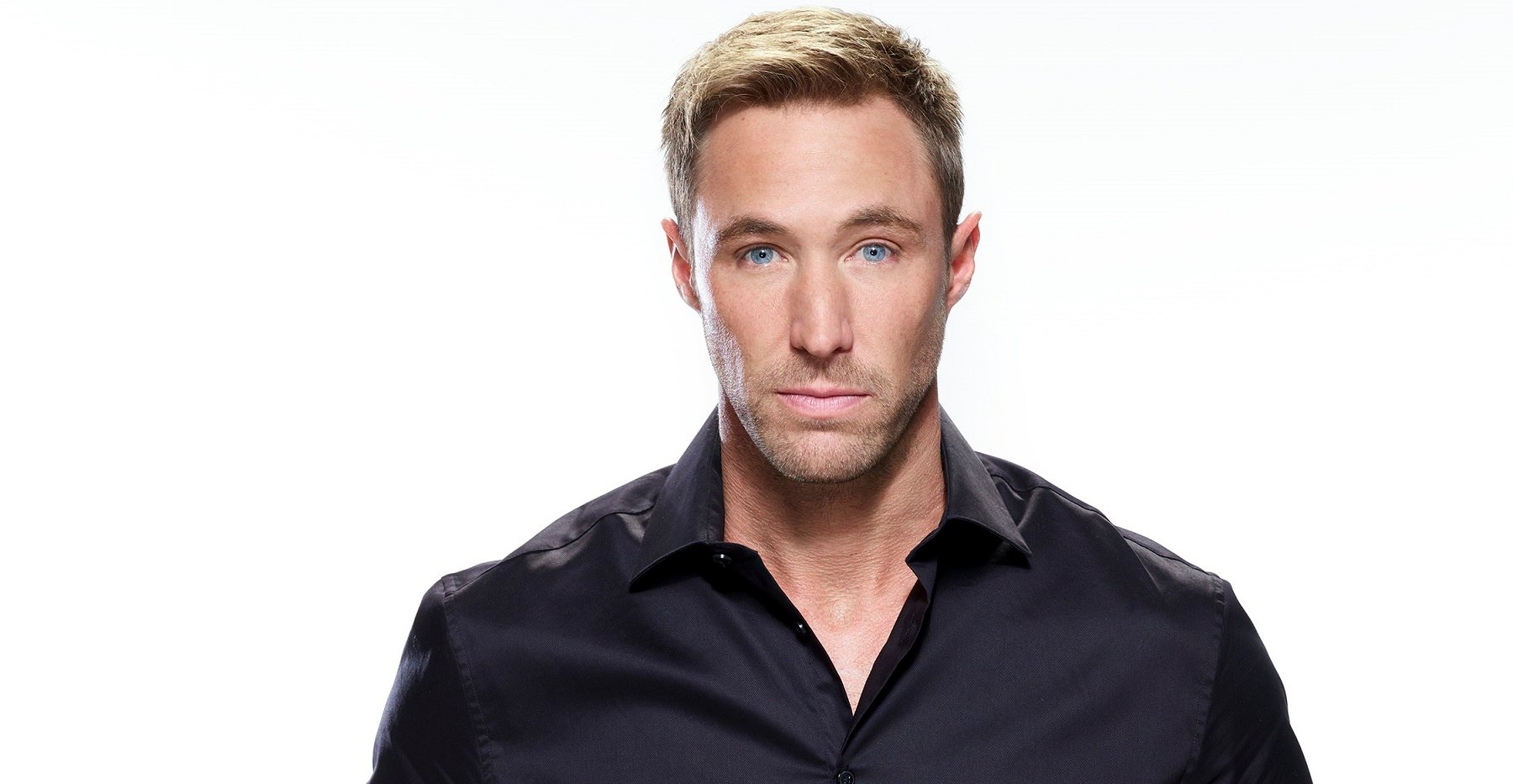 Days of Our Lives comings and goings focus on Kyle Lowder as Rex Brady, pictured here in a black collared shirt
