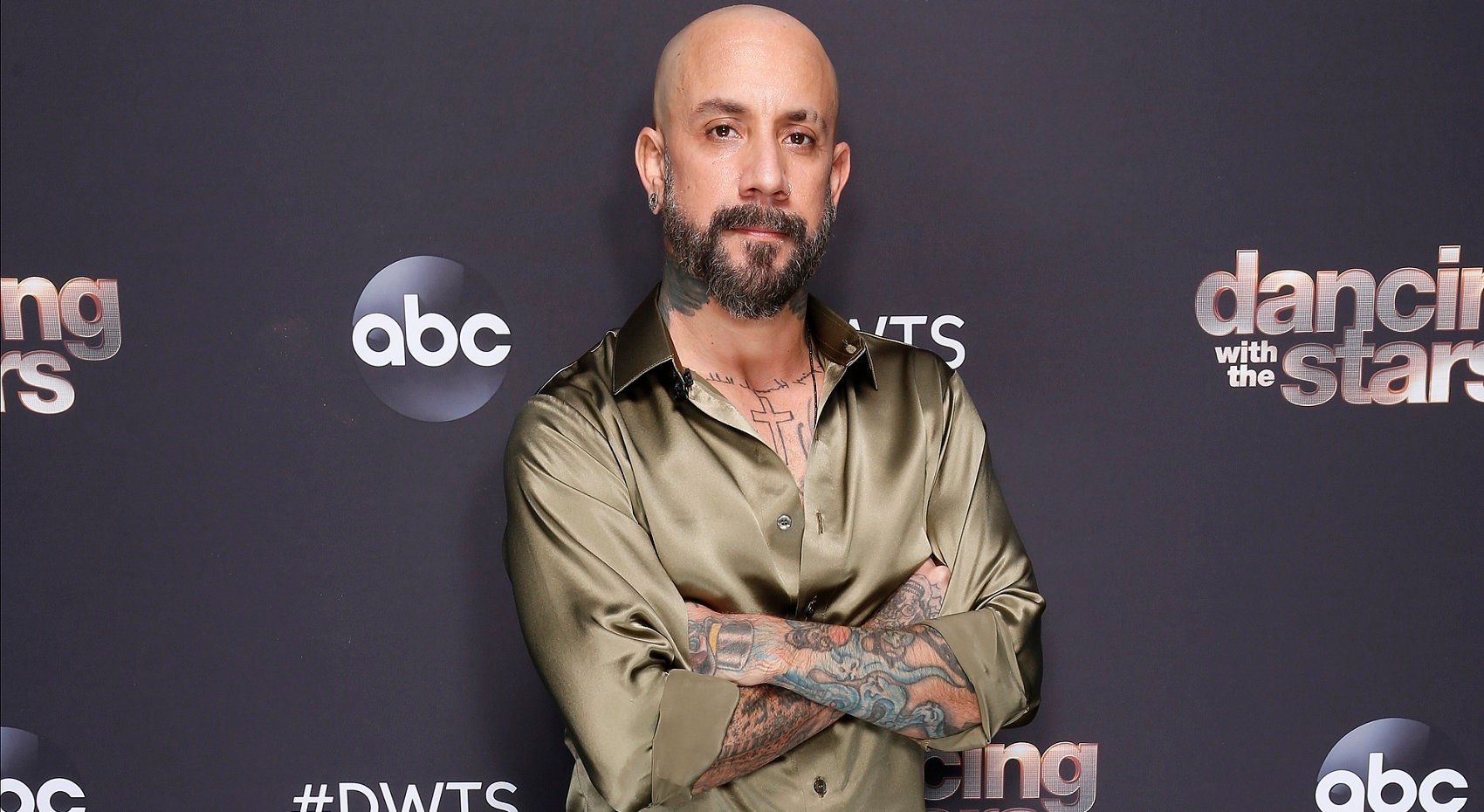 AJ McLean of the Backstreet Boys in a tan long-sleeve shirt