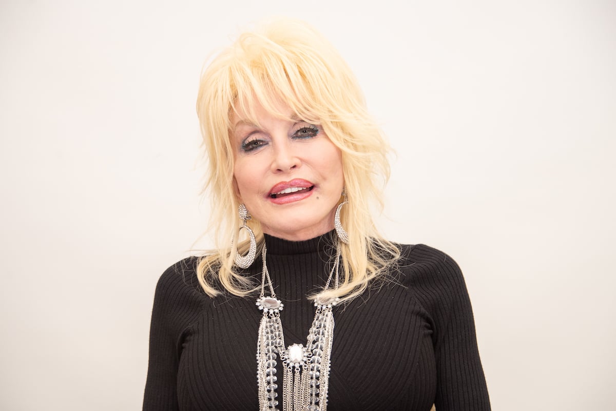 Dolly Parton wears black.