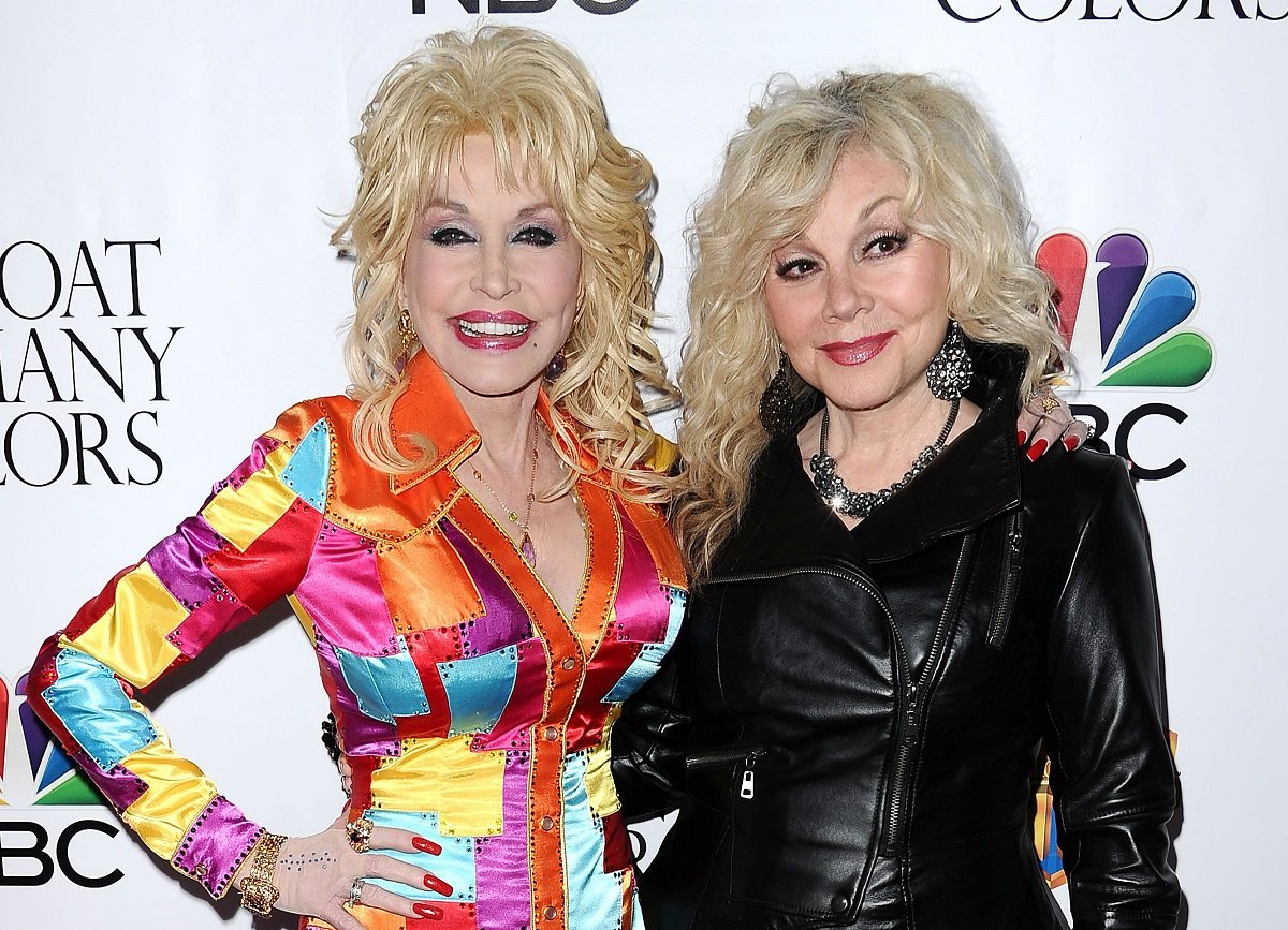 Dolly Parton and Stella Parton attend the premiere of Dolly Parton's Coat Of Many Colors