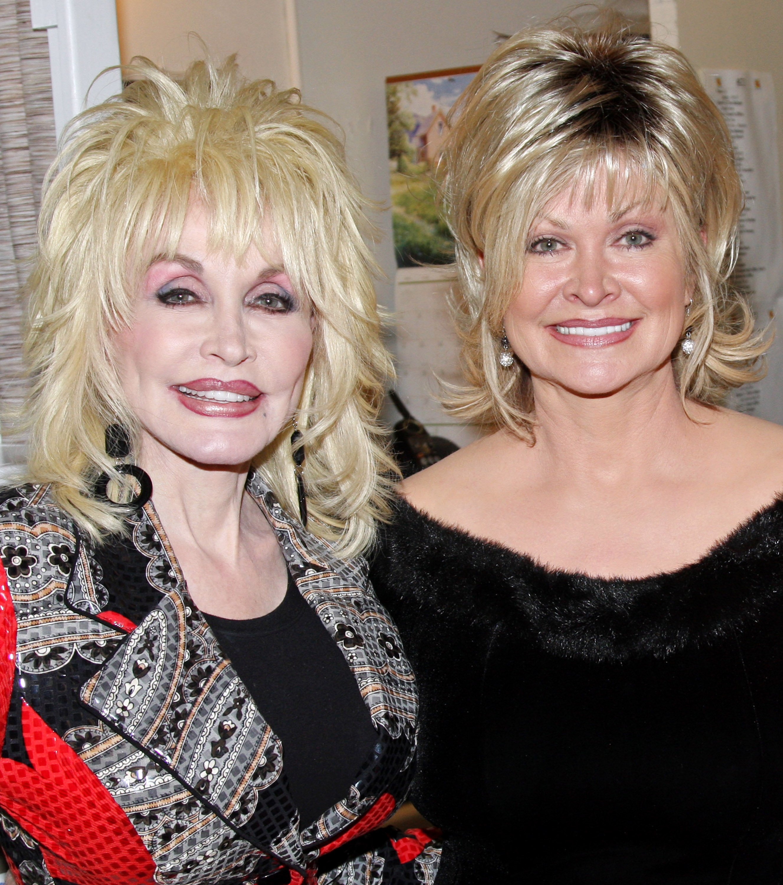 Dolly Parton and her sister Rachel Parton Dennison pose backstage at the musical 9 to 5 on Broadway