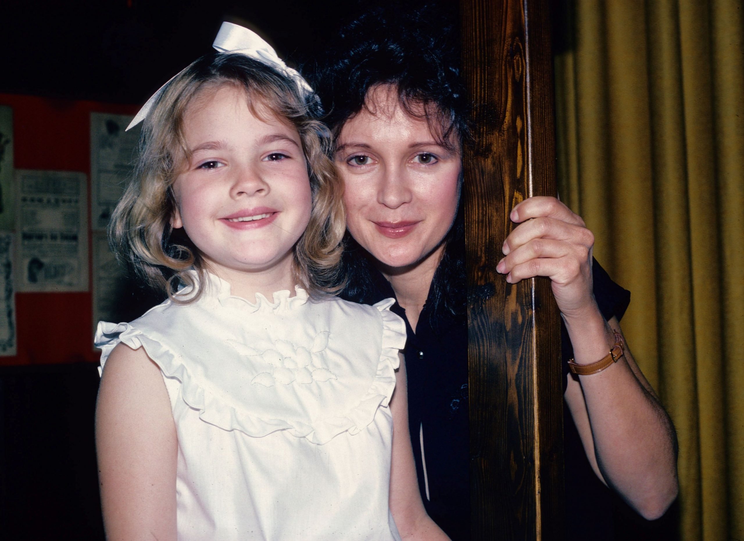 Drew Barrymore, in white, poses for a photograph June 8, 1982 with her mother Jaid Barrymore, in black