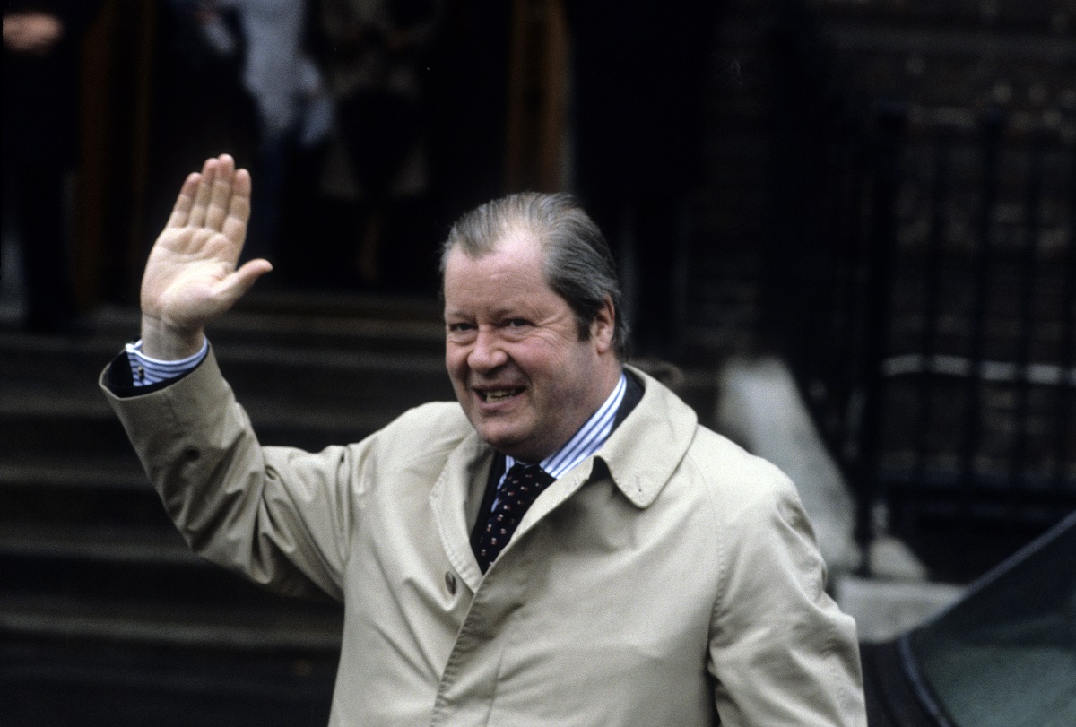 Earl John Spencer waving after visiting his daughter Princess Diana at St. Mary's Hospital following the birth of Prince William