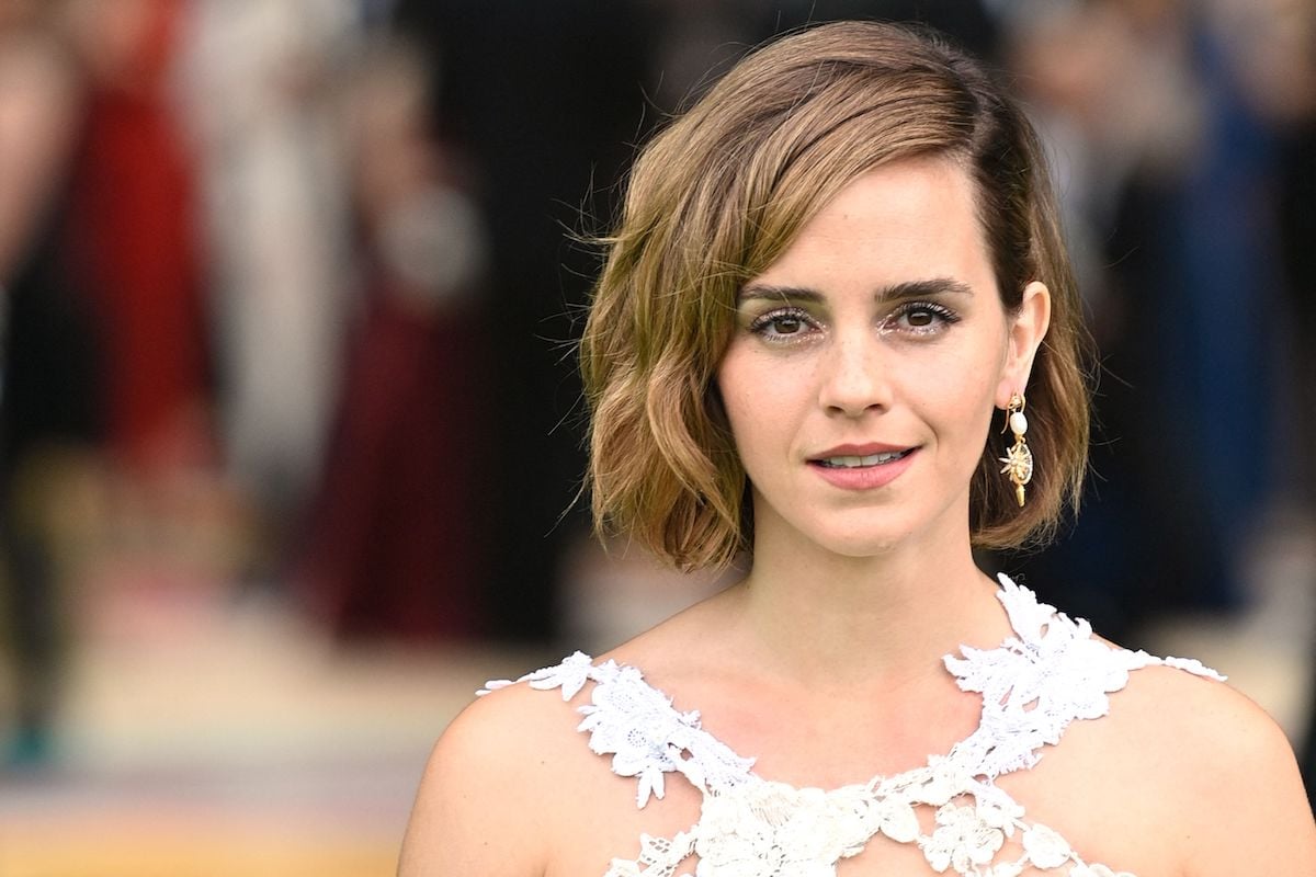 Harry Potter alum Emma Watson in a white floral dress