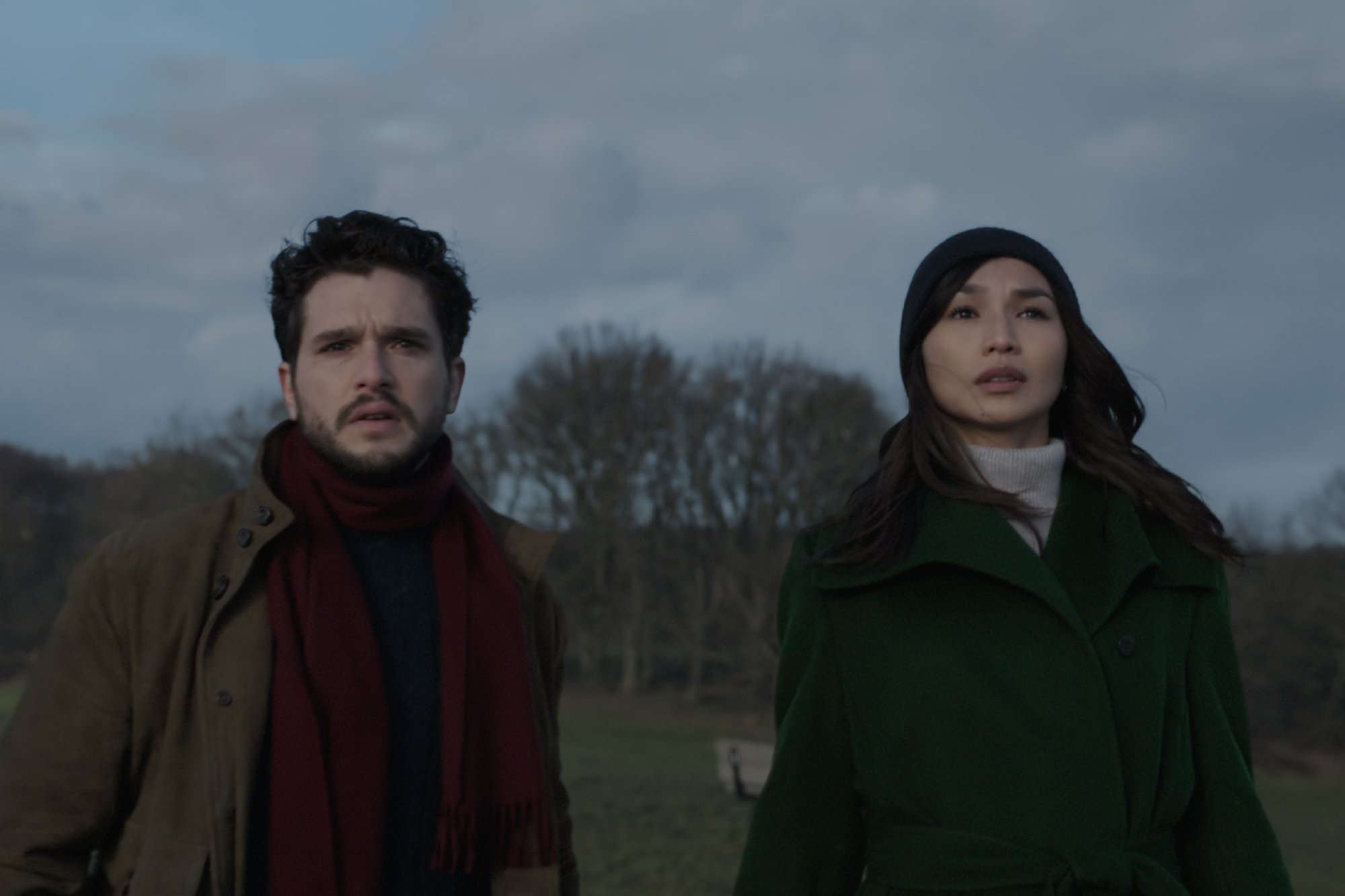 'Eternals': 'Game of Thrones' actor Kit Harington as Dane Whitman and Gemma Chan as Sersi looking shocked in a field