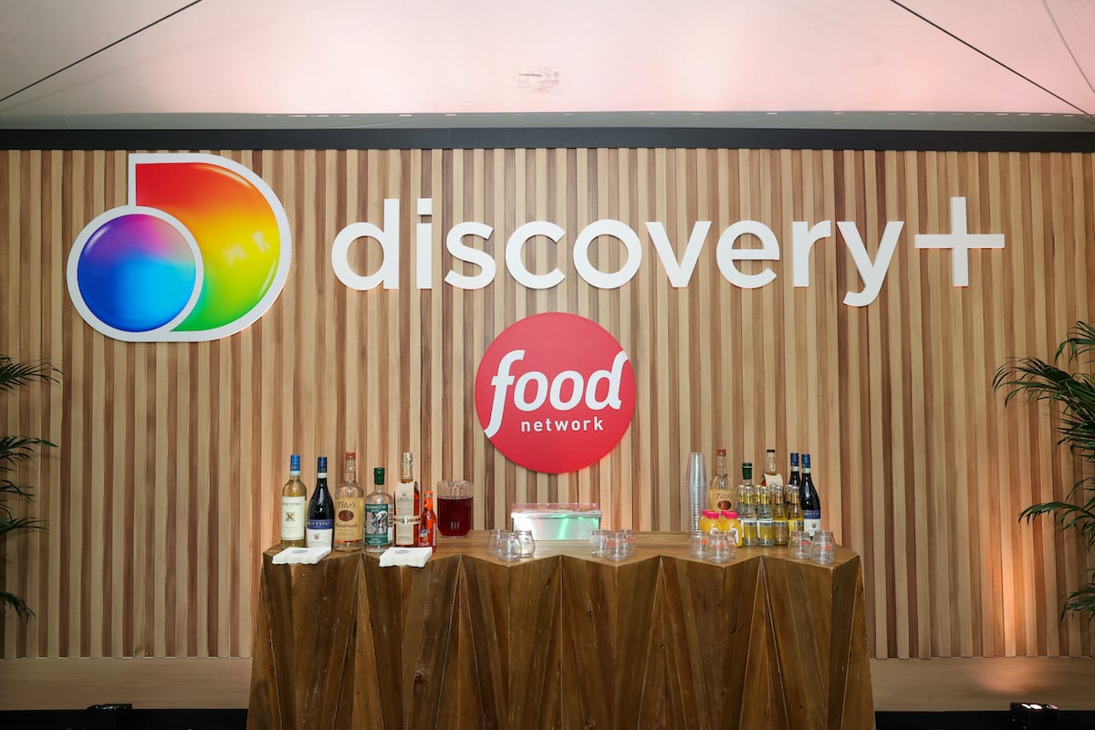 Discovery+ and Food Network Logo on a wall behind a bar