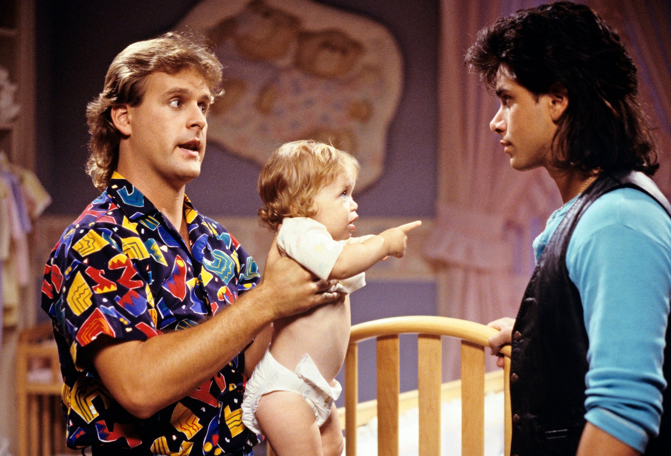 Dave Coulier as Joey Gladsotone, Mary Kate Olsen as Michelle Tanner and John Stamos as Jesse Katsopolis in 'Full House'