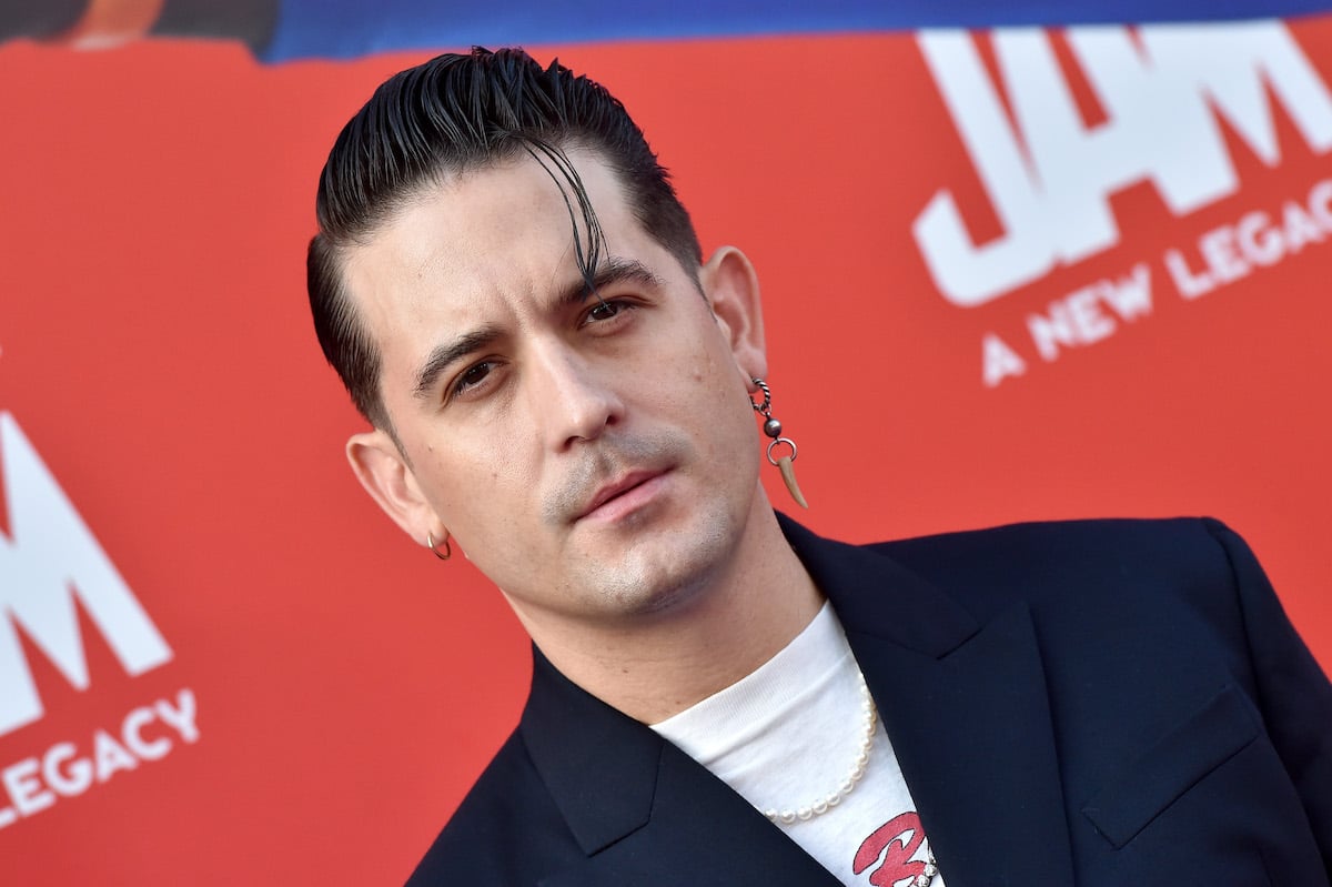 G-Eazy poses at an event.