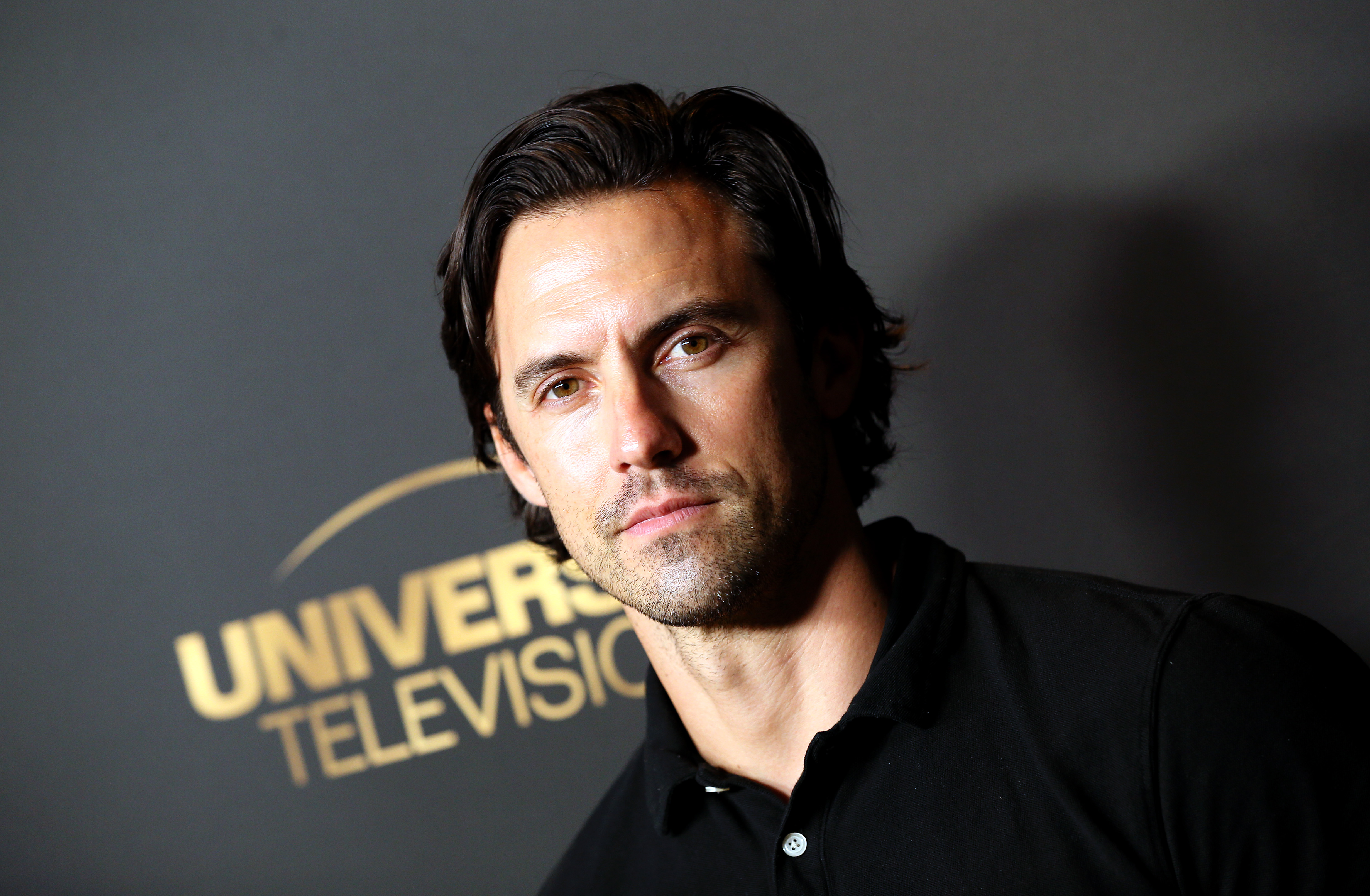 'This Is Us' star Milo Ventimiglia wears a black polo shirt.