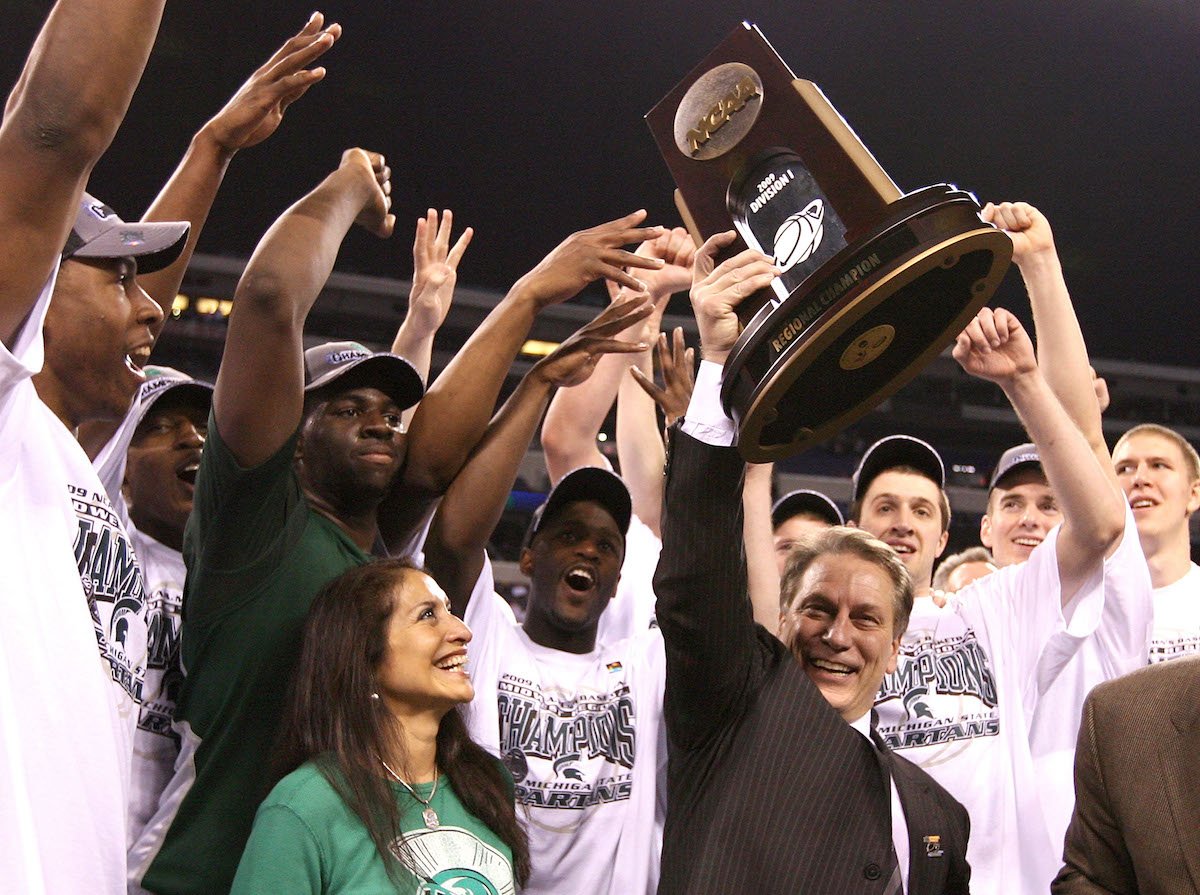 Head coach Tom Izzo of the Michigan State Spartans and his wife, Lupe, celebrate a win