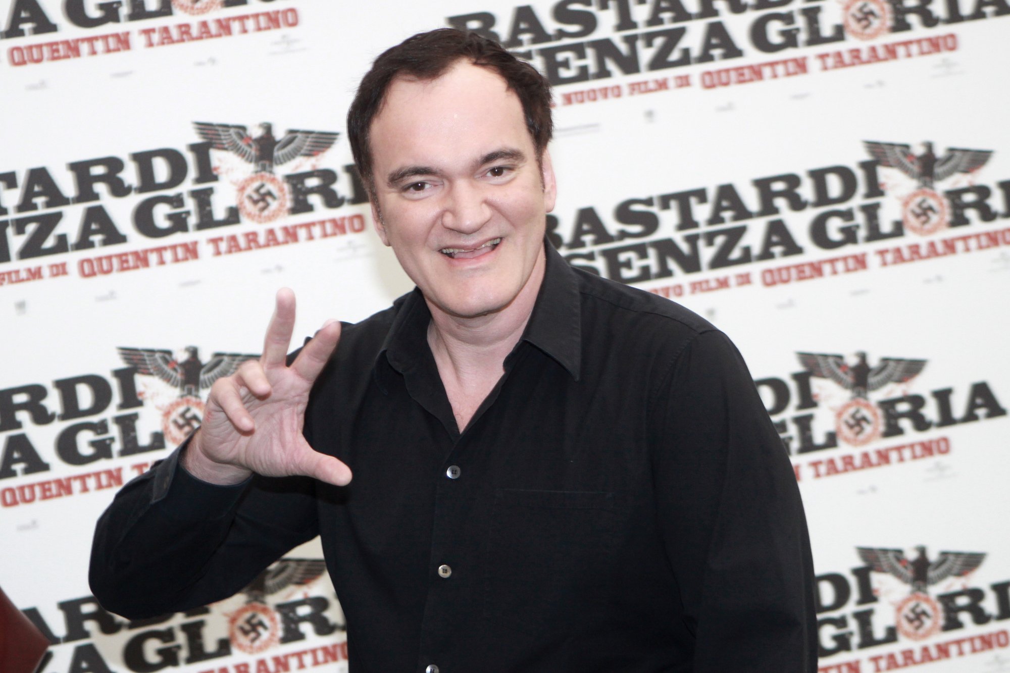 'Inglourious Basterds' Quentin Tarantino at the photocall wearing a black-collared shirt