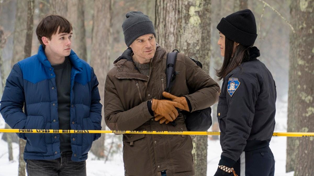 Jack Alcott as Harrison Morgan, Michael C. Hall as Dexter Morgan, and Julia Jones as Angela in 'Dexter: New Blood' Episode 2 'Storm of F***'