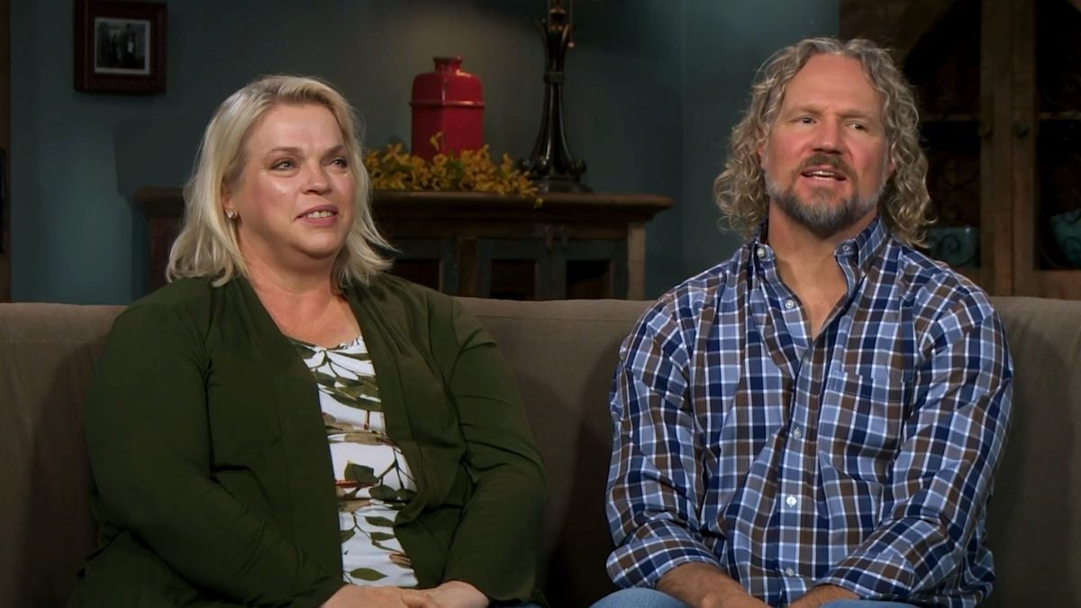 Janelle Brown and Kody Brown sitting together on a couch during interview for 'Sister Wives' | TLC