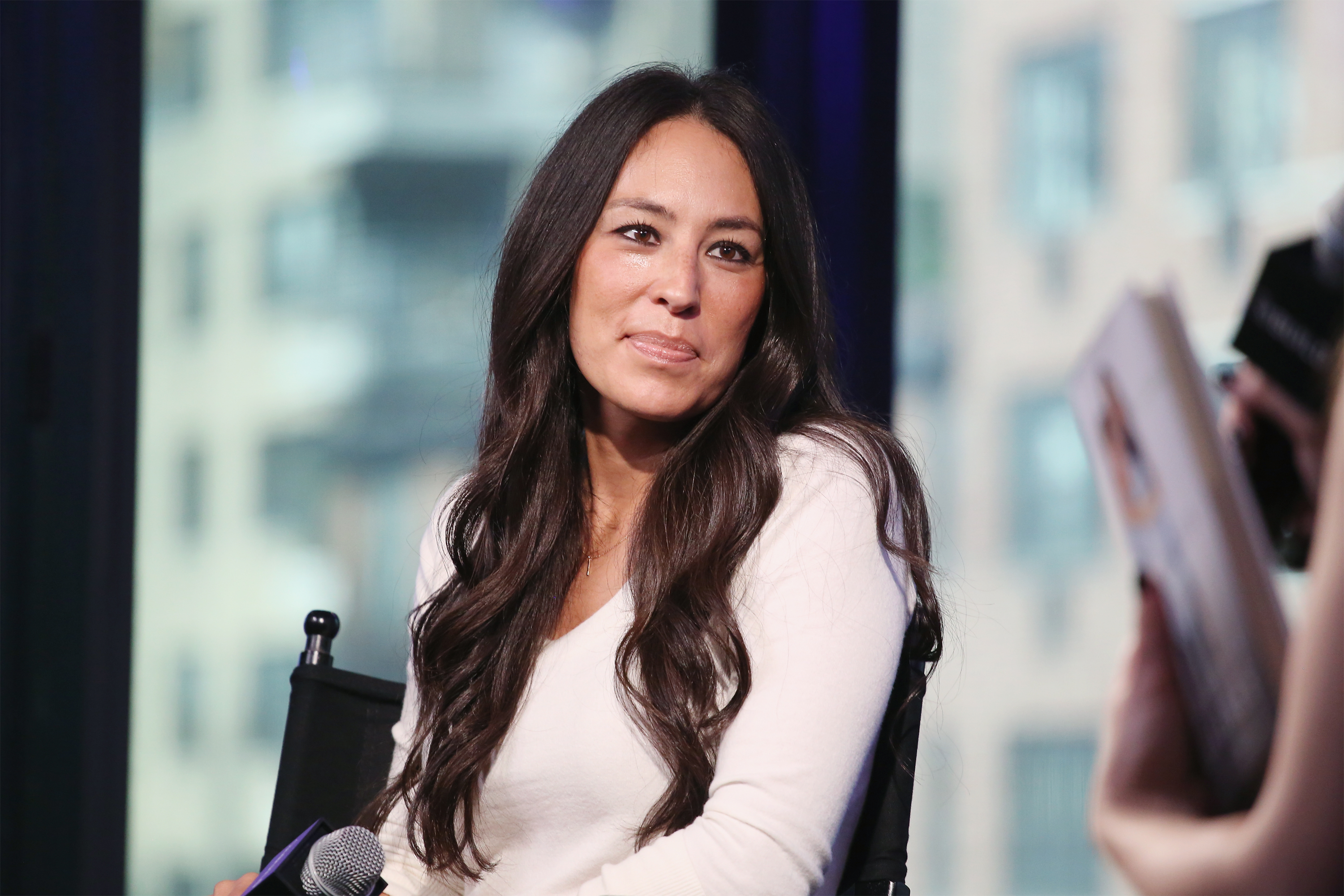 Joanna Gaines in a white top during an interview