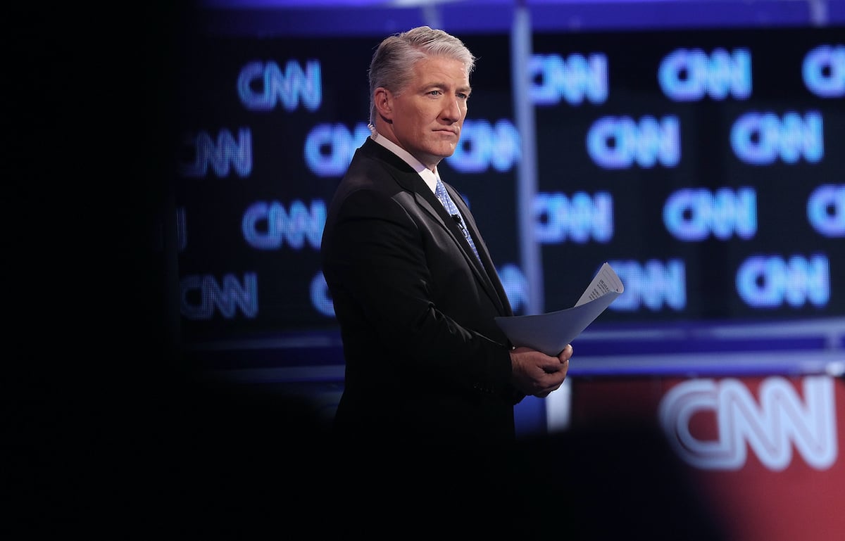 John King in front of a CNN background