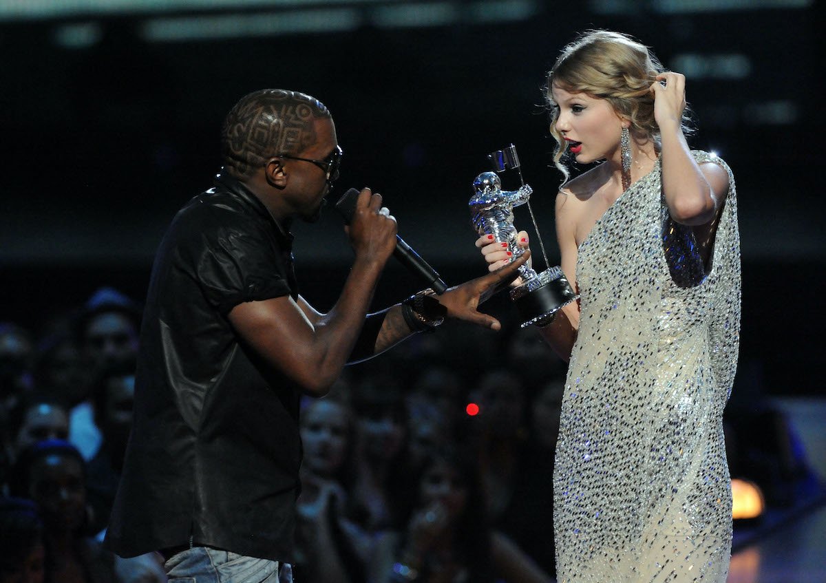 Kanye West interrupts a speech by Taylor Swift onstage at the 2009 VMAs