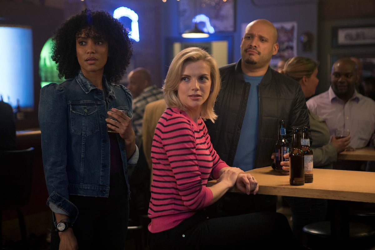 Annie Ilonzeh as Emily Foster, Kara Killmer as Sylvie Brett, and Joe Minoso as Joe Cruz act during a scene on Chicago Fire