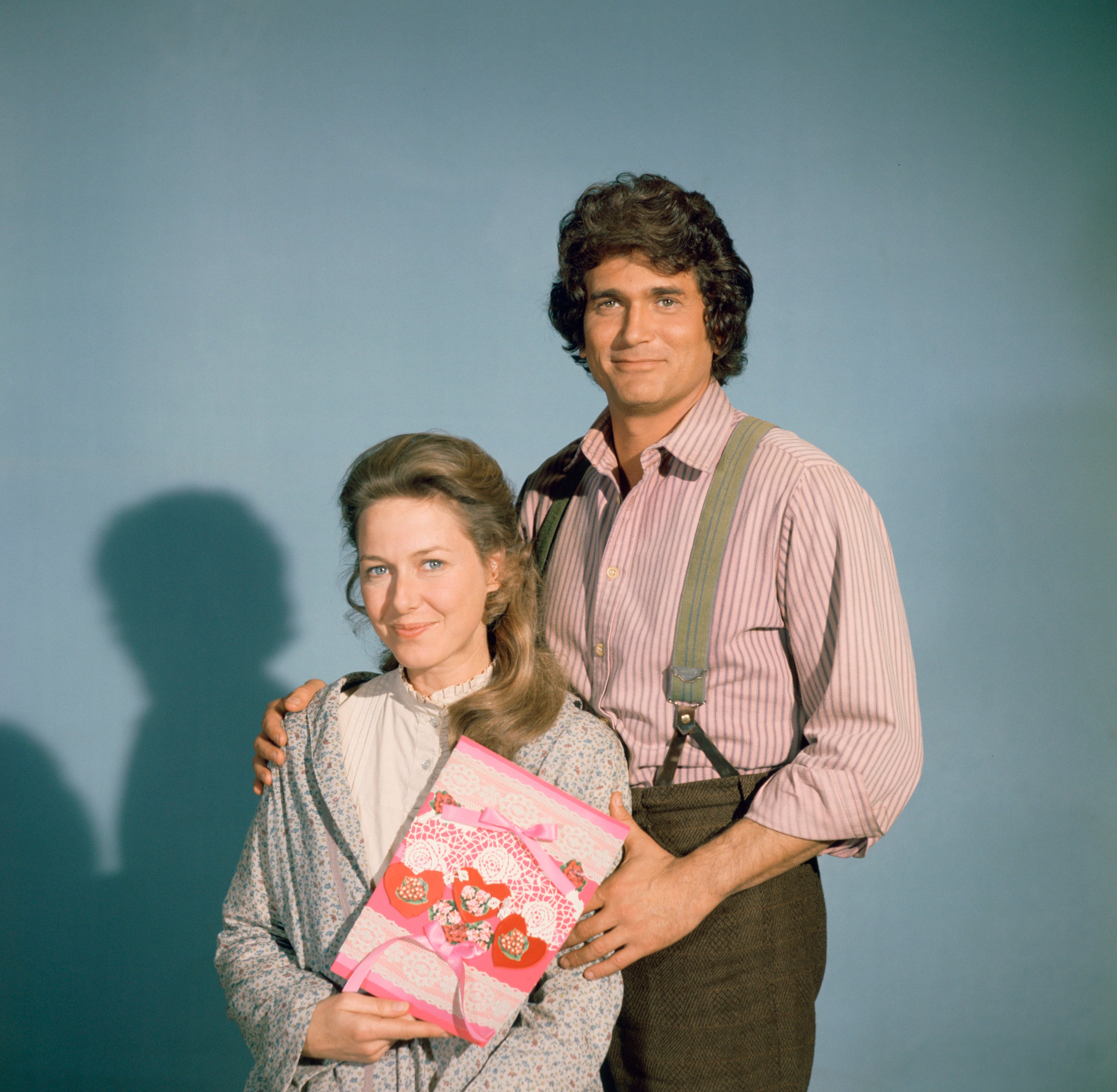 Karen Grassle and Michael Landon pose  as Charles and Caroline Ingalls