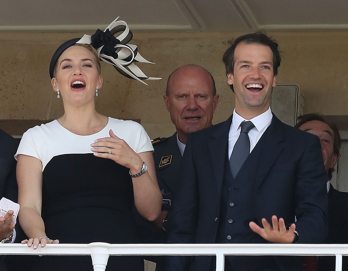 Kate Winslet and Edward smiling together Abel Smith