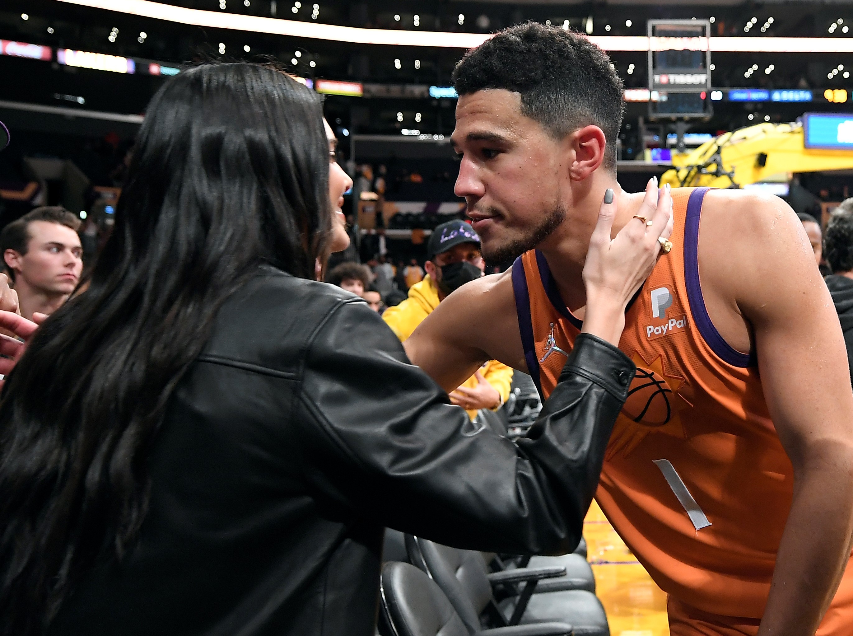 Kendall Jenner and Devin Booker kiss and hug after Suns game