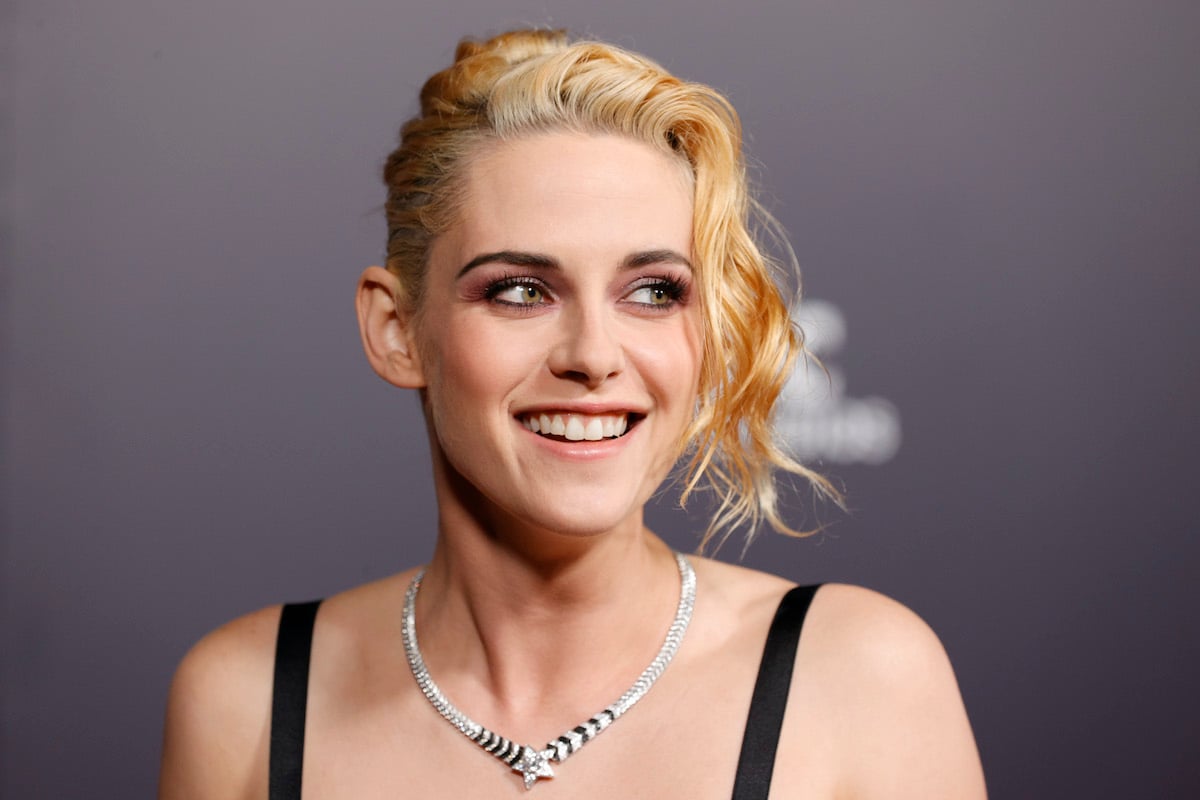 Kristen Stewart smiles for the camera at the 'Spencer' premiere