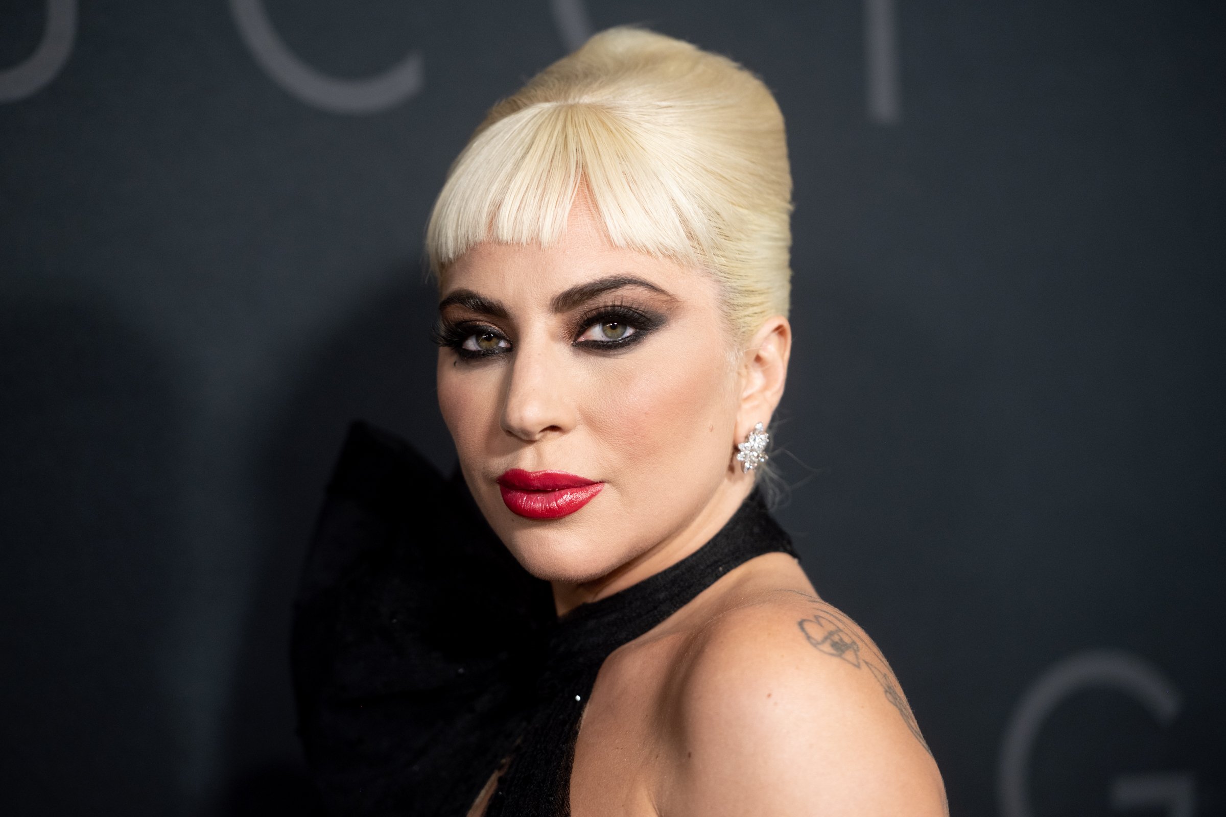 headshot of Lady Gaga — who plays Patrizia Reggiani and delivers the line "Father, Son, and House of Gucci — at the 'House of Gucci' premiere