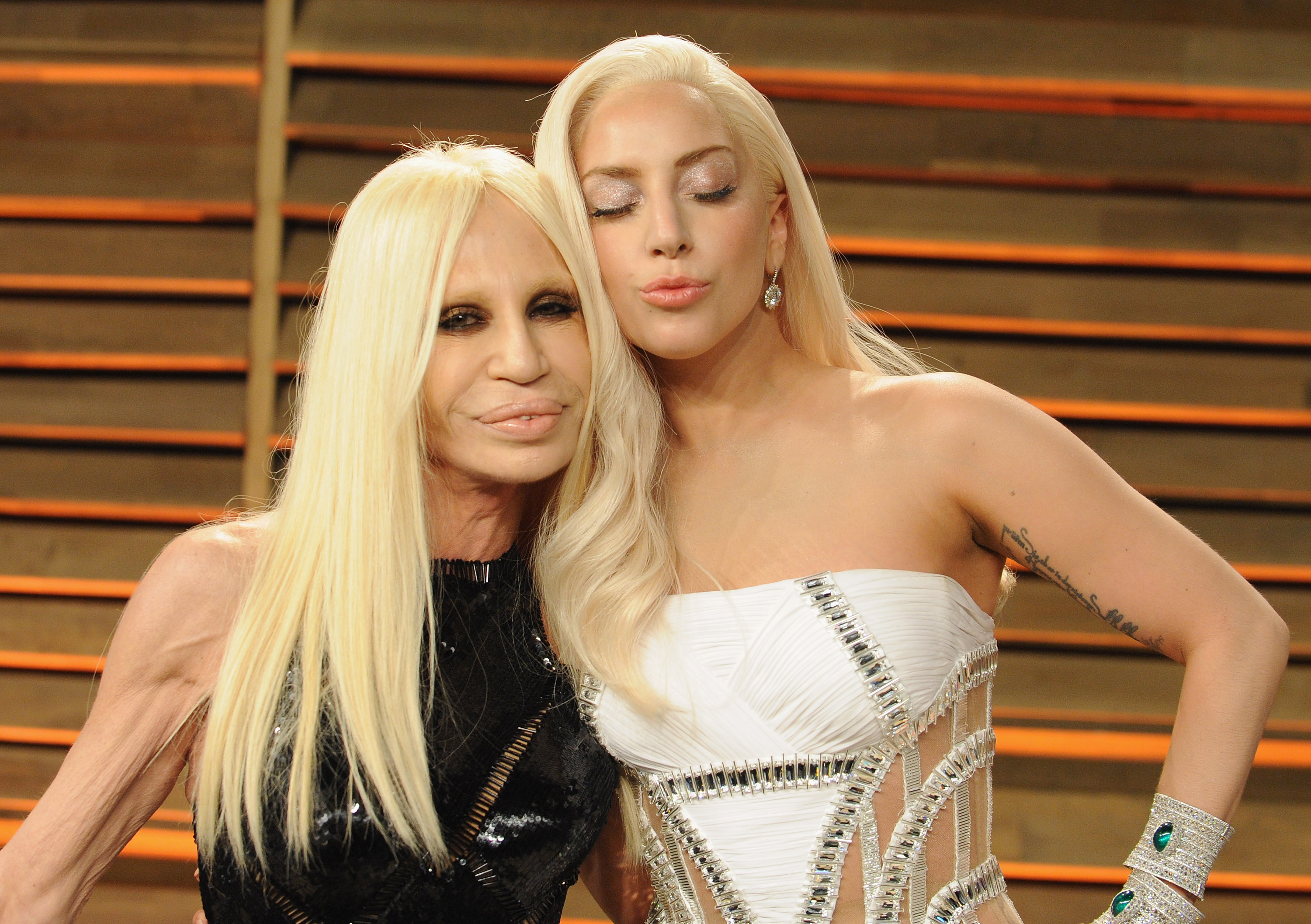 Donatella Versace and Lady Gaga posing for a photo