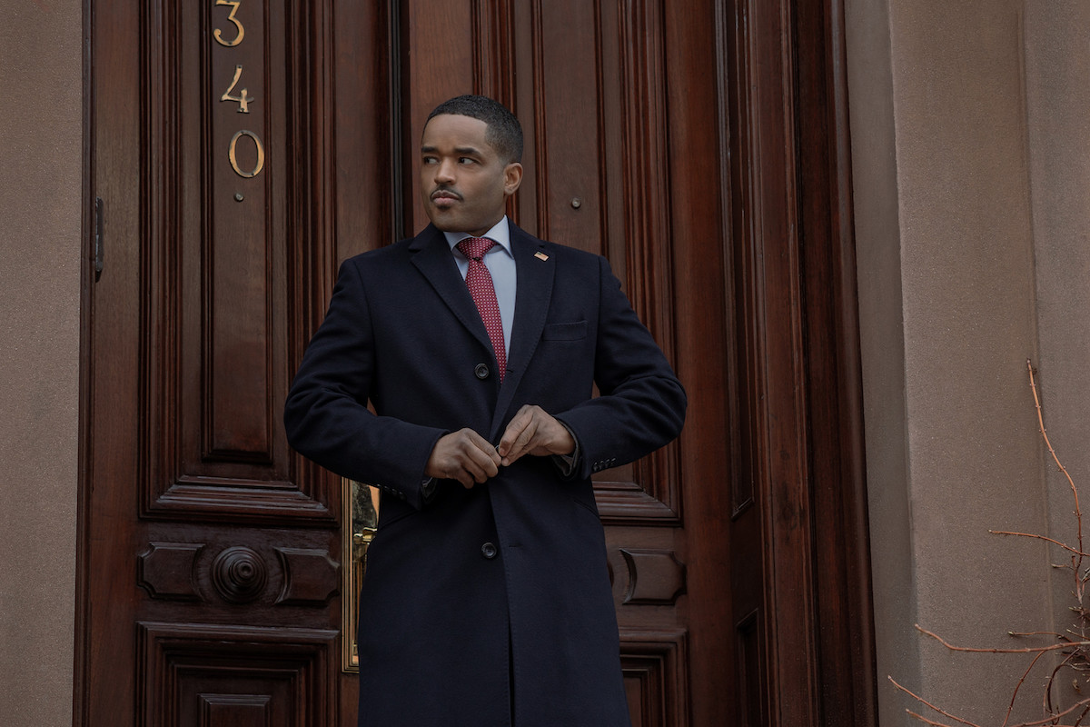 Larenz Tate as Rashad Tate wearing a black coat in 'Power Book II: Ghost'