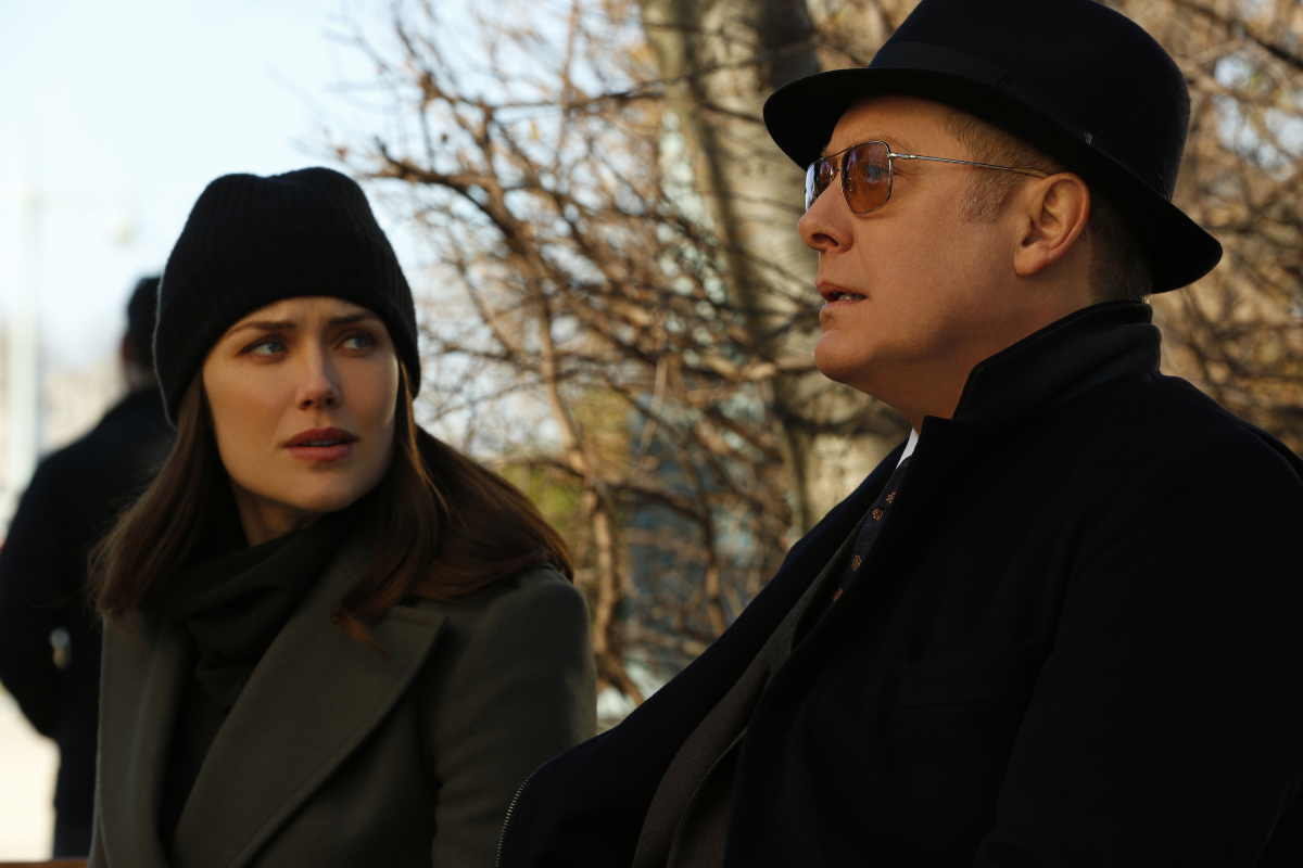 Megan Boone as Liz and James Spader as Red in The Blacklist. Liz and Red are talking on a park bench.