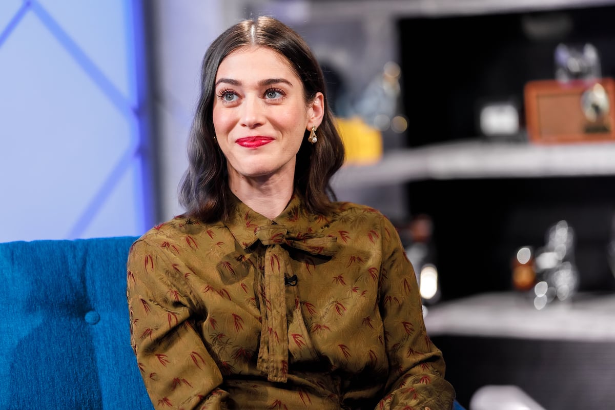 'Party Down' actor Lizzy Caplan wearing a brown blouse during an appearance on 'The IMDb Show'