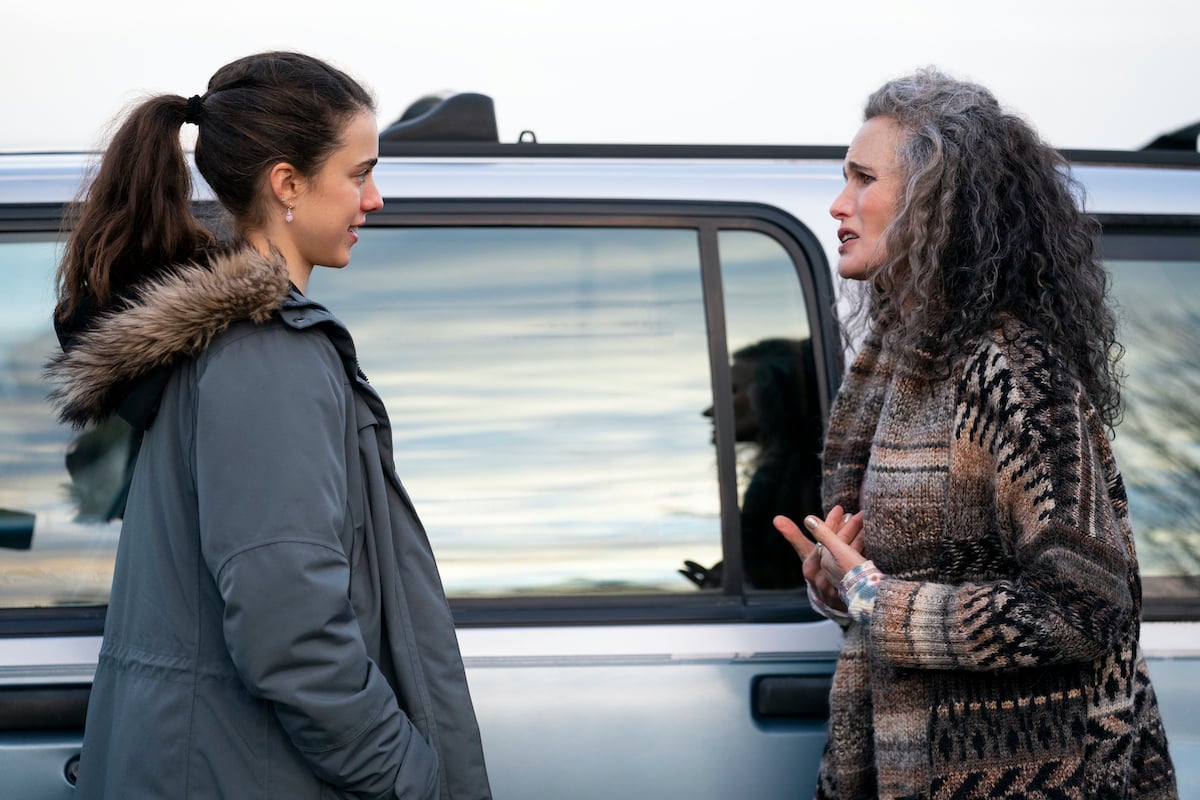 (L-R) Margaret Qualley as Alex and Andie MacDowell as Paula talking, standing next to a car in a scene from 'MAID'