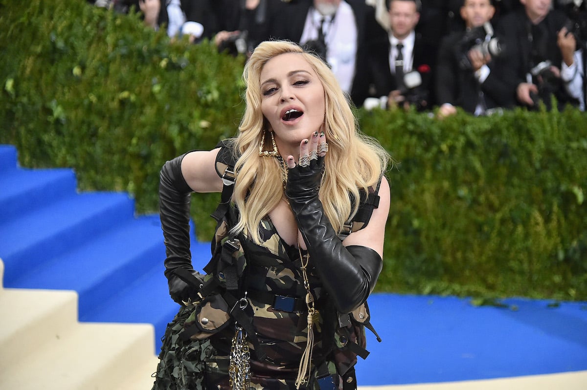 Madonna blows a kiss at the camera.