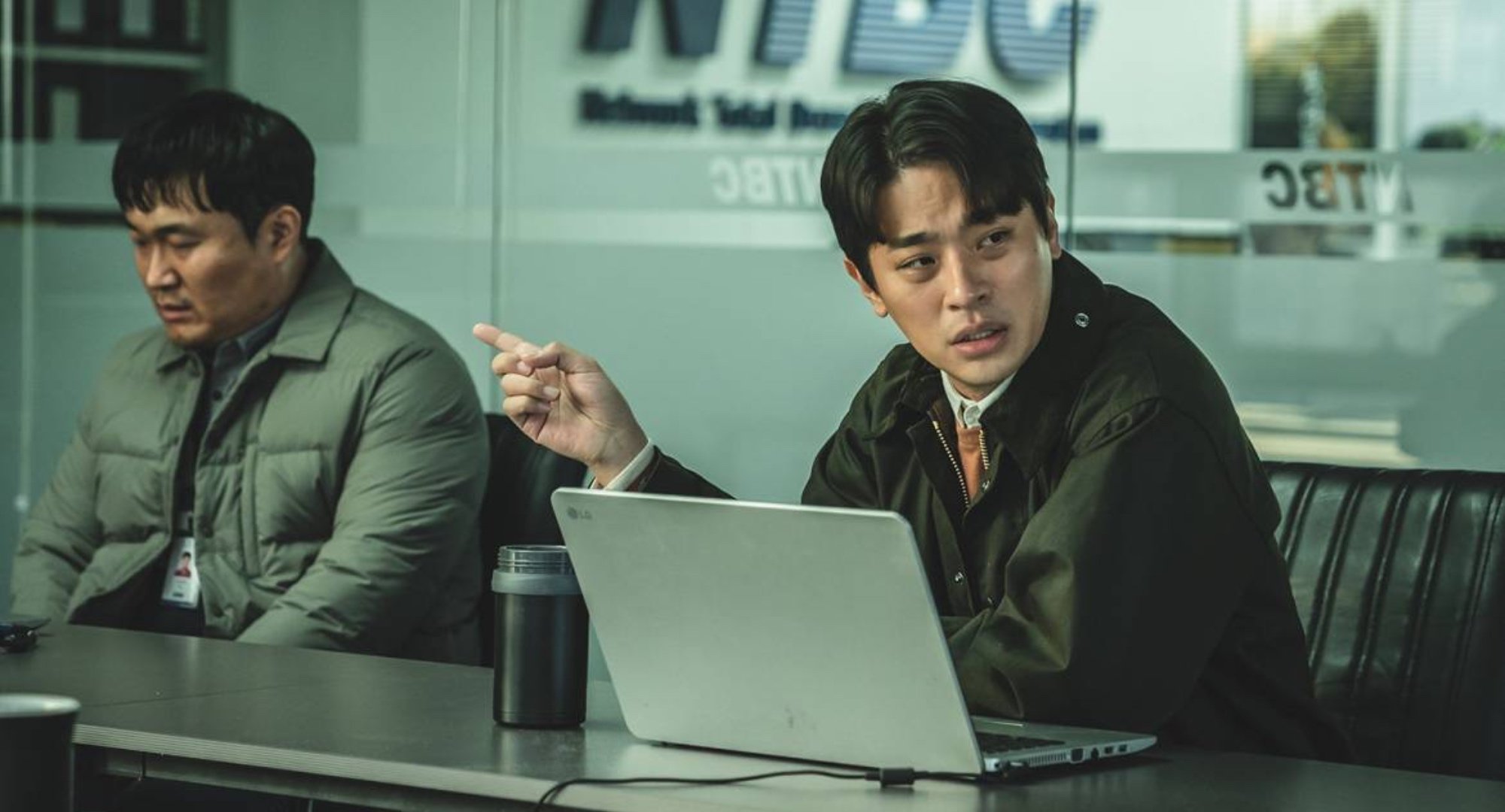 Main character Bae Young-ae from Netflix's 'Hellbound' in work meeting.