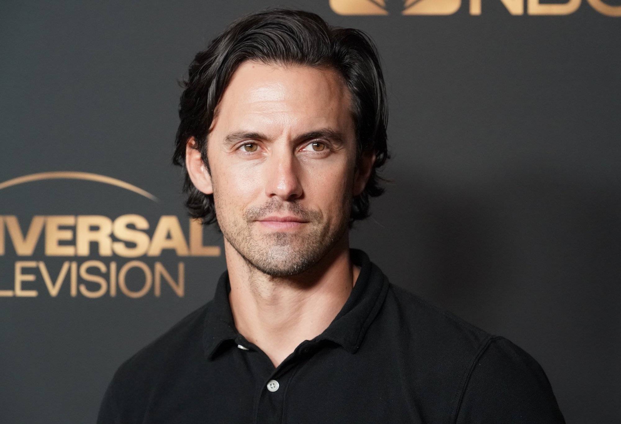 'Gilmore Girls' star Milo Ventimiglia, who plays Rory's love interest Jess. His dark hair is slicked back, and he's wearing a black shirt.