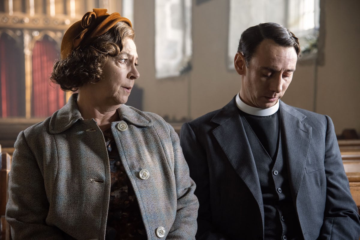 Mrs. C looking at Leonard in church in an episode of 'Grantchester'