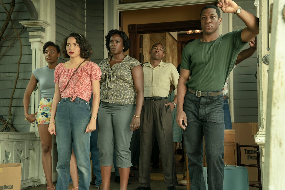 Naomi Mack, Jurnee Smollett, Wunmi Mosaku, Keon Mitchell, and Jonathan Majors standing on the house porch in 'Lovecraft Country.'