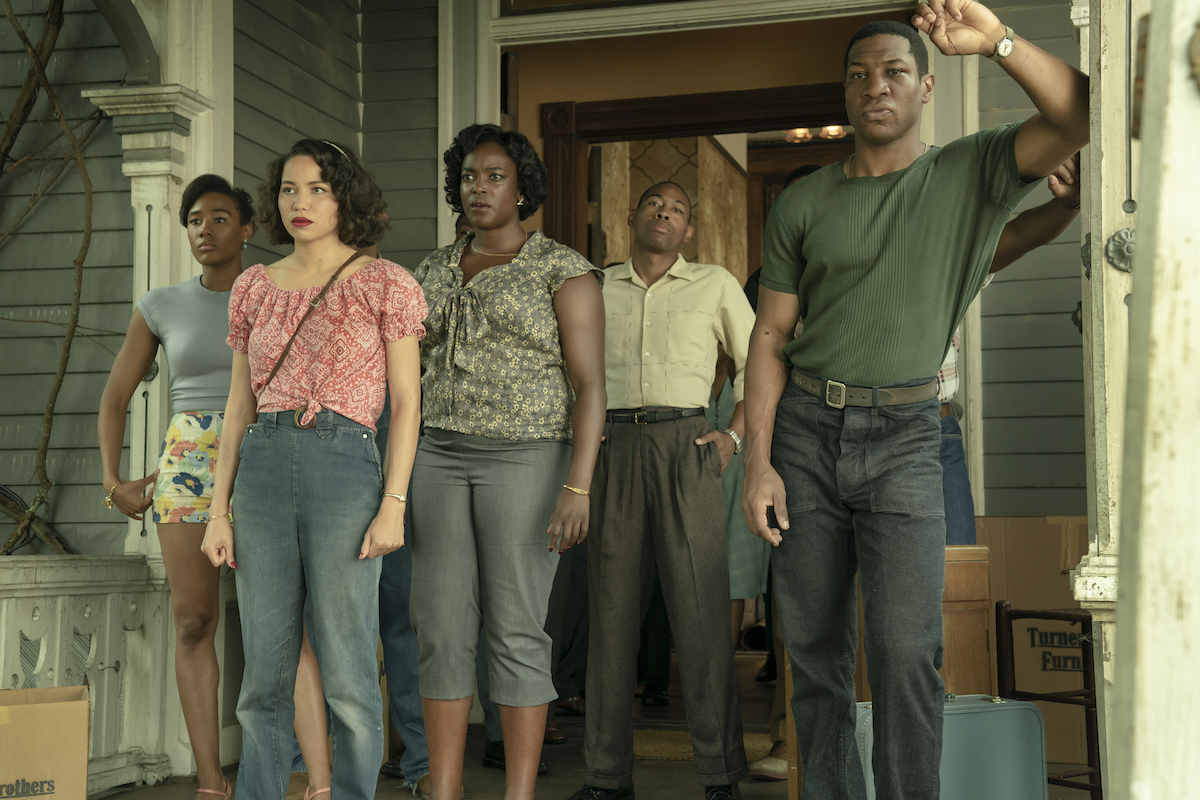 Naomi Mack, Jurnee Smollett, Wunmi Mosaku, Keon Mitchell, and Jonathan Majors standing on the house porch in 'Lovecraft Country.'