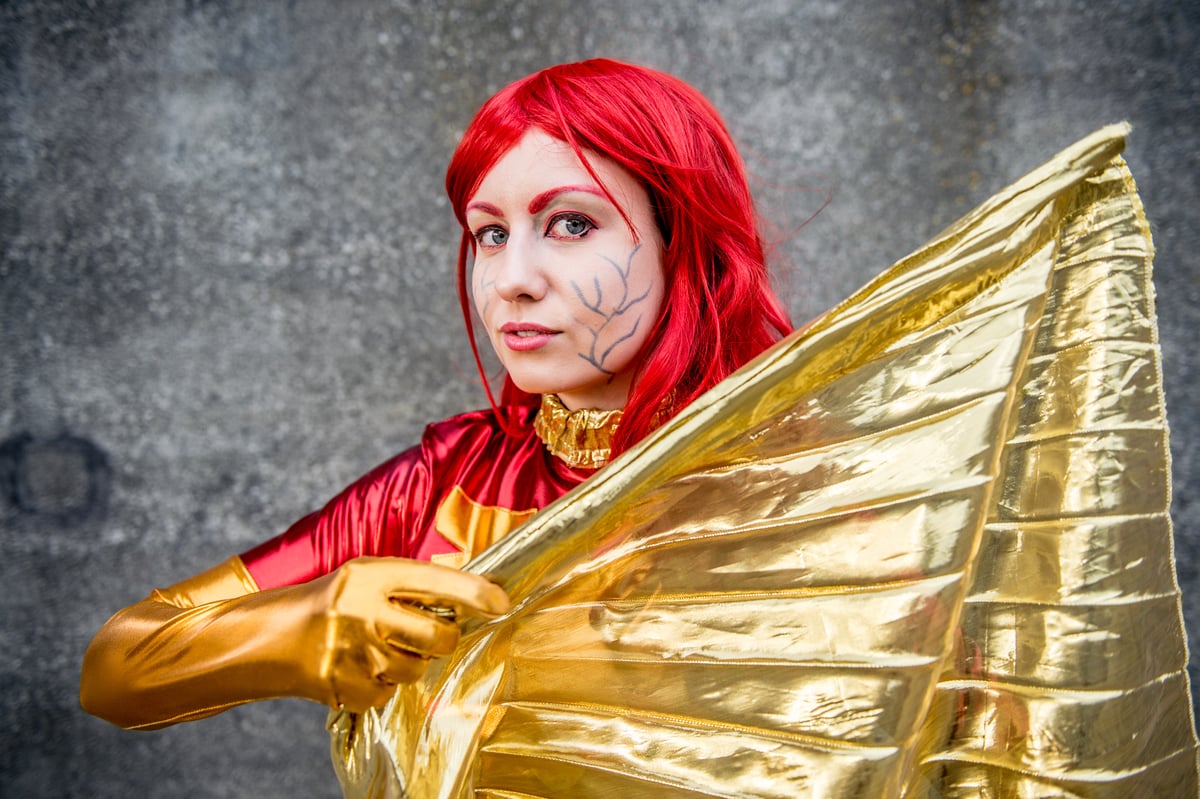 Cosplayer as the redheaded X-Men Jean Grey at MCM London Comic Con 2017